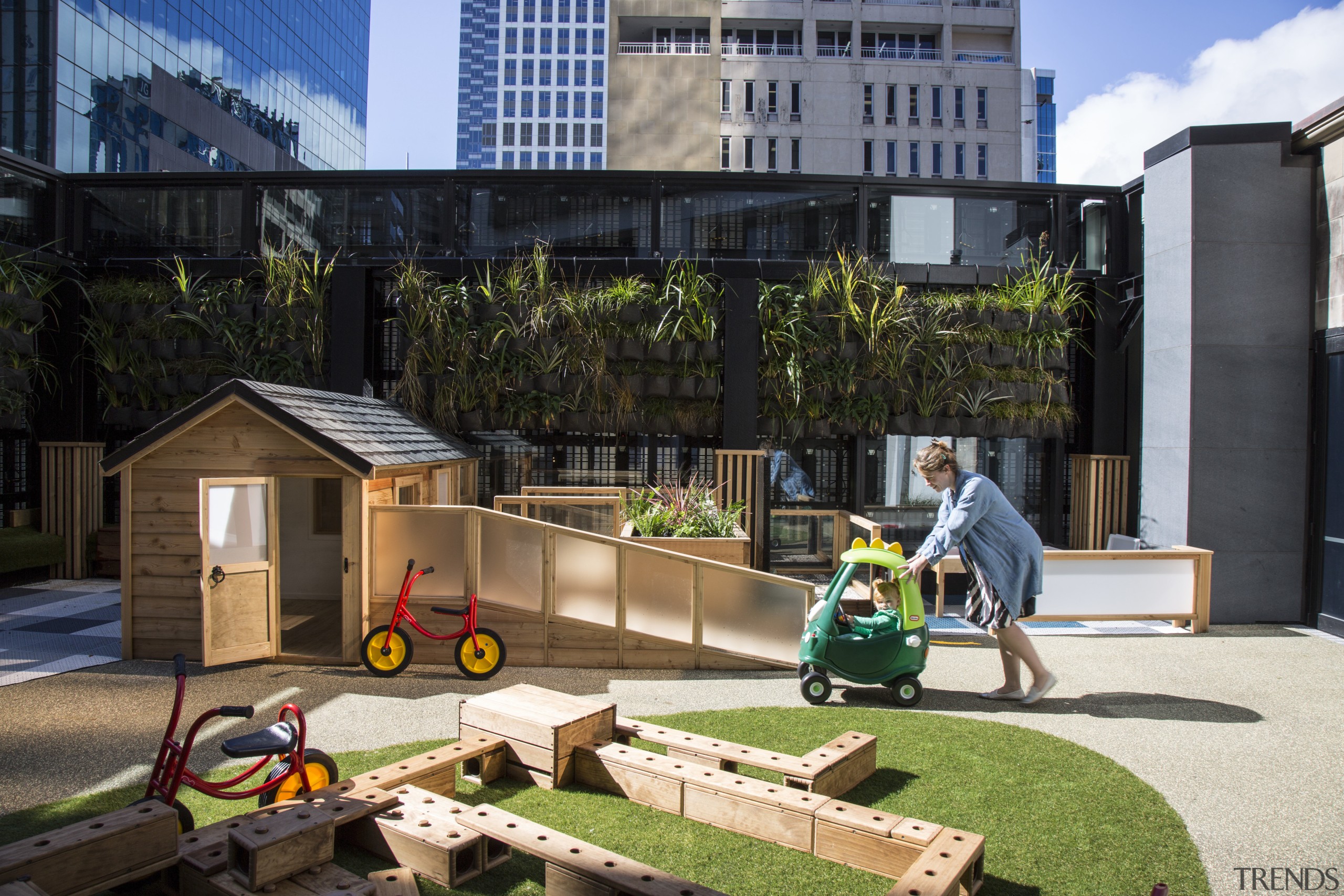 Cosmokids sunny outdoor play area sits at third architecture, backyard, home, house, neighbourhood, playground, public space, recreation, residential area, black