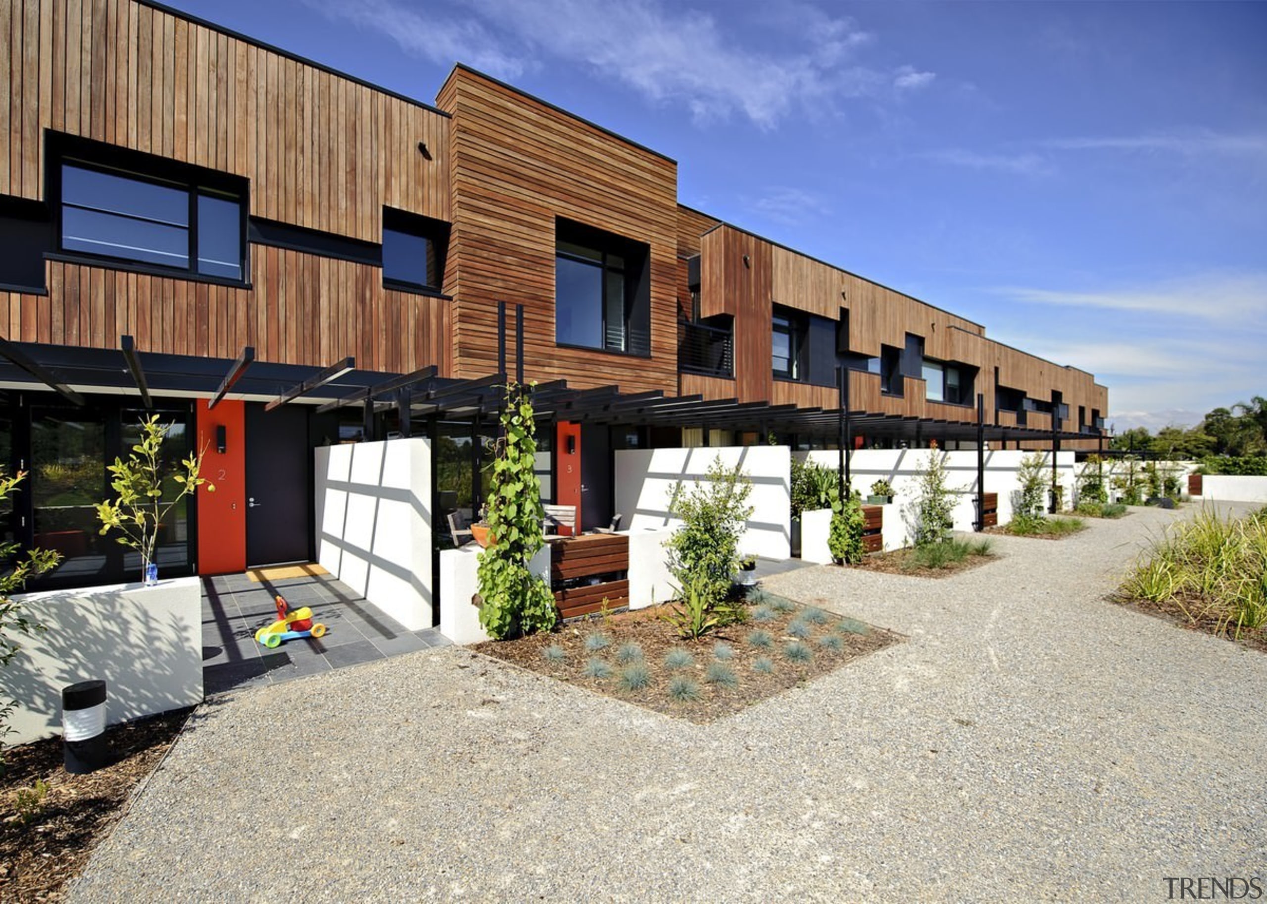 There's a real sense of community in this facade, home, house, property, real estate, gray