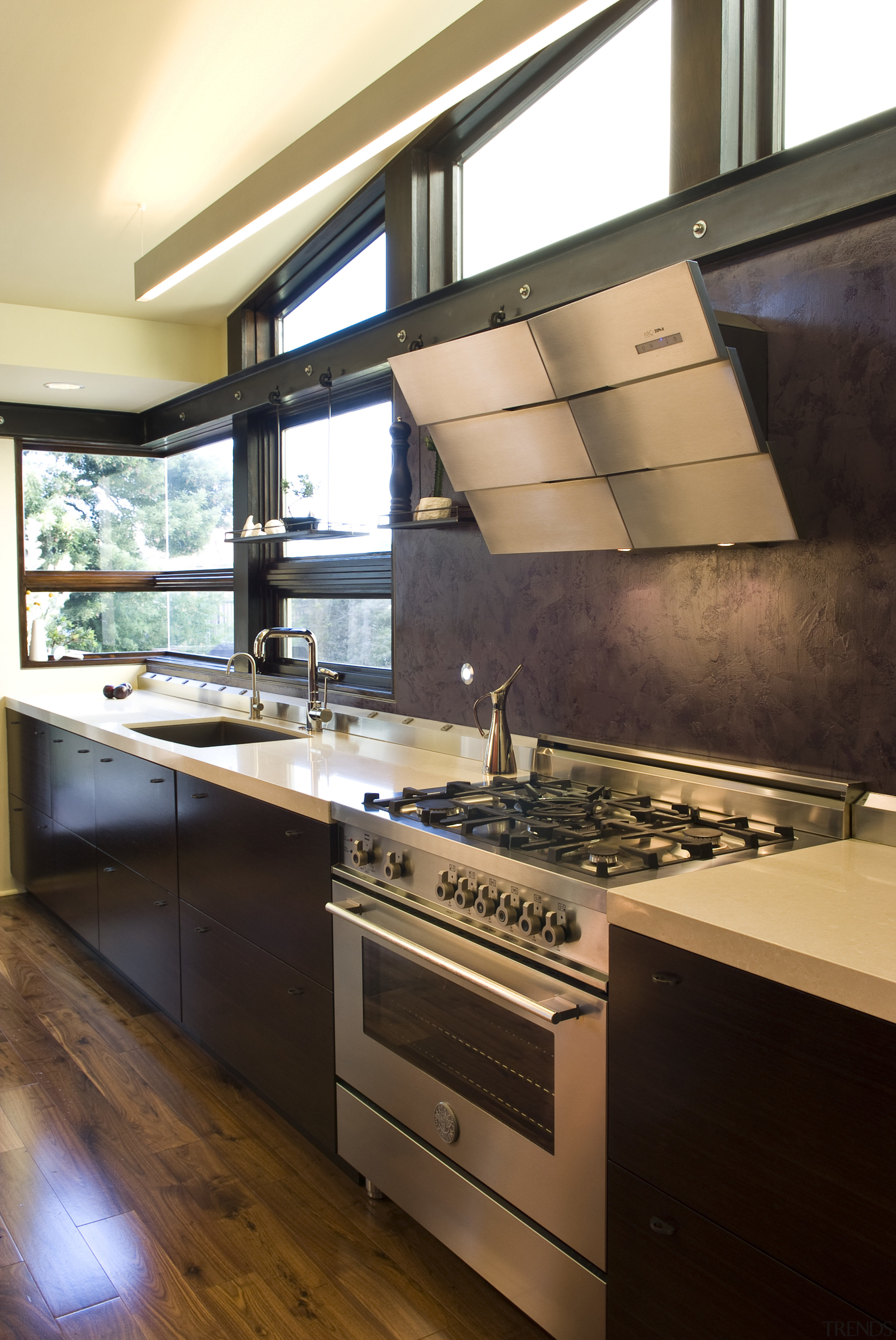 View of a remodeled kitchen which features custom cabinetry, countertop, cuisine classique, interior design, kitchen, room, black