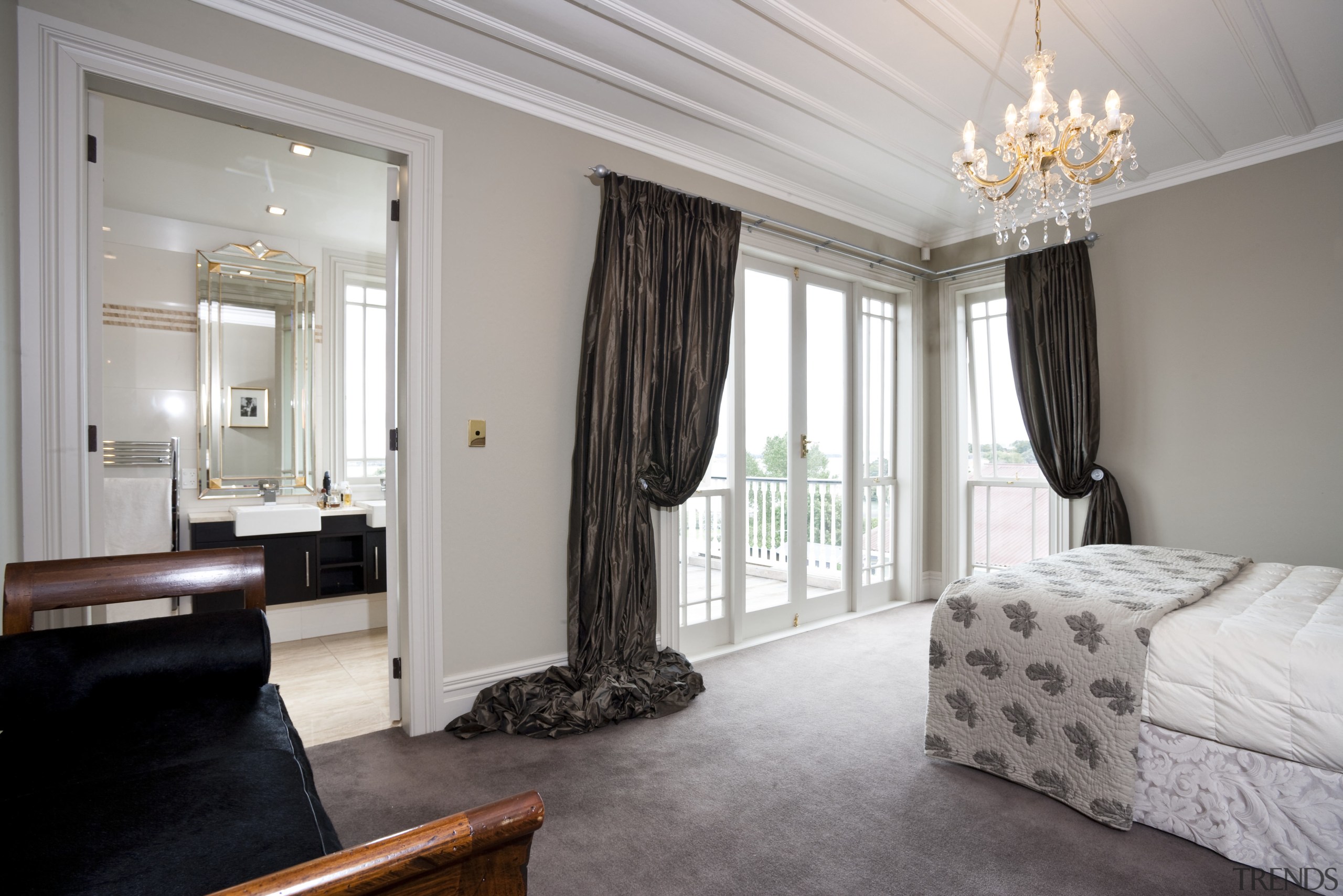 The bedroom of this traditonal home - The bedroom, ceiling, curtain, floor, home, interior design, living room, property, real estate, room, suite, wall, window, window covering, window treatment, gray