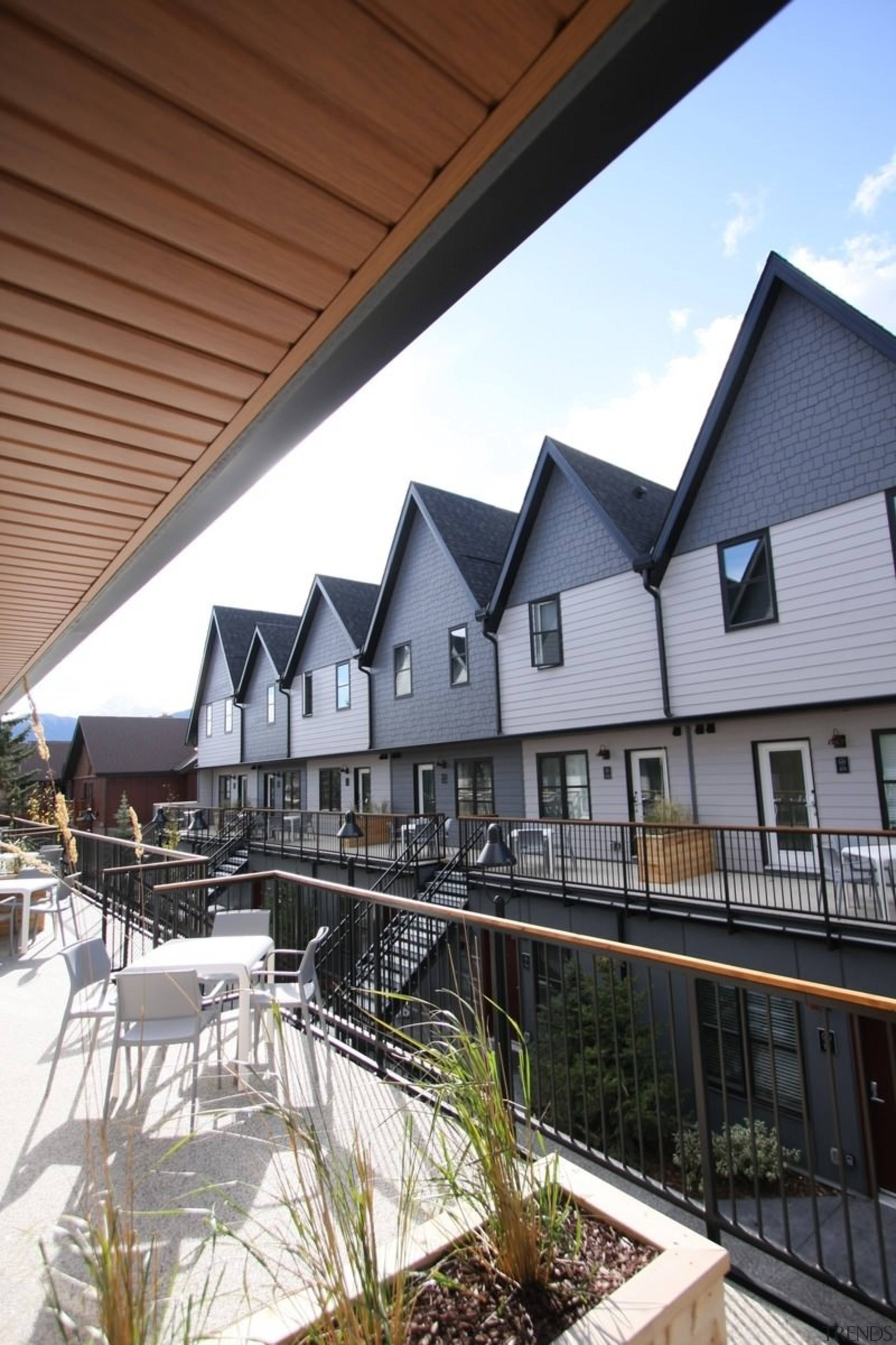 Another view of the courtyard - Another view architecture, building, cottage, daylighting, estate, facade, home, house, outdoor structure, property, real estate, residential area, roof, siding, window