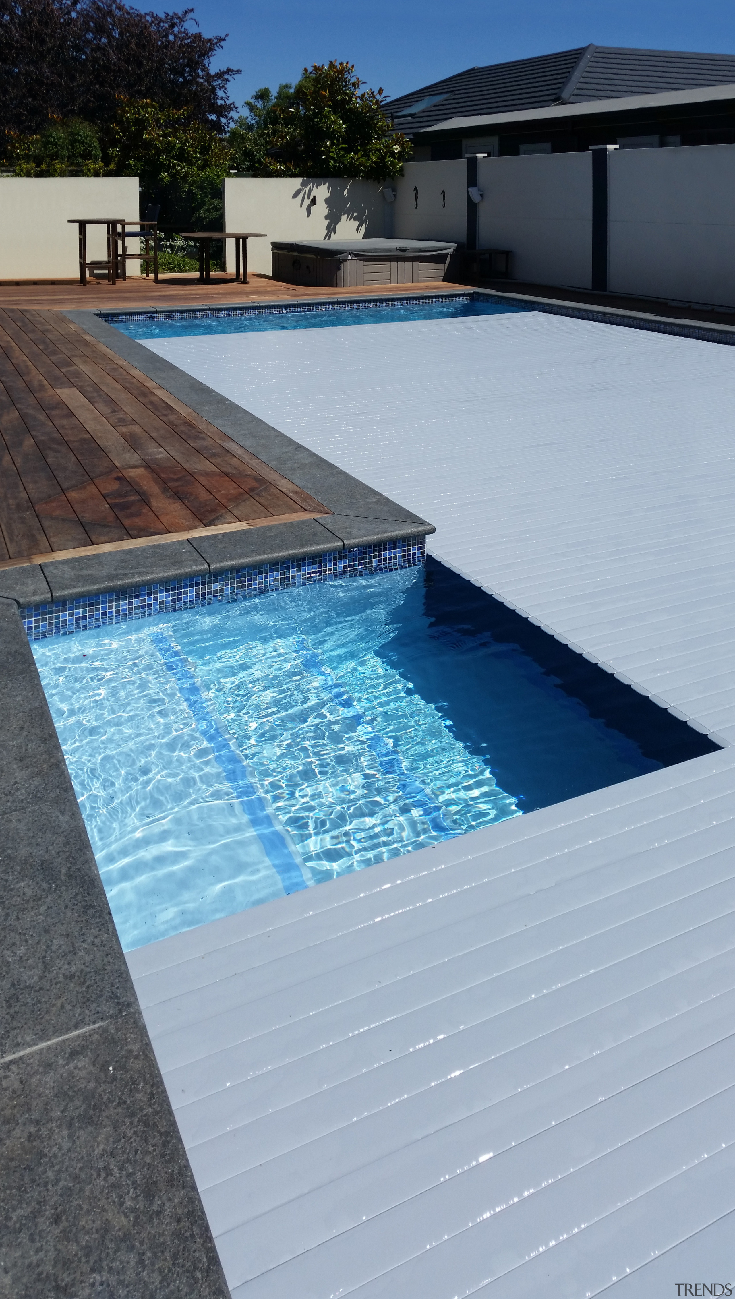 ​​​​​​​Roll Out Roll Under slatted covers are a architecture, composite material, floor, leisure, property, real estate, rectangle, swimming pool, tile, water, water feature, gray