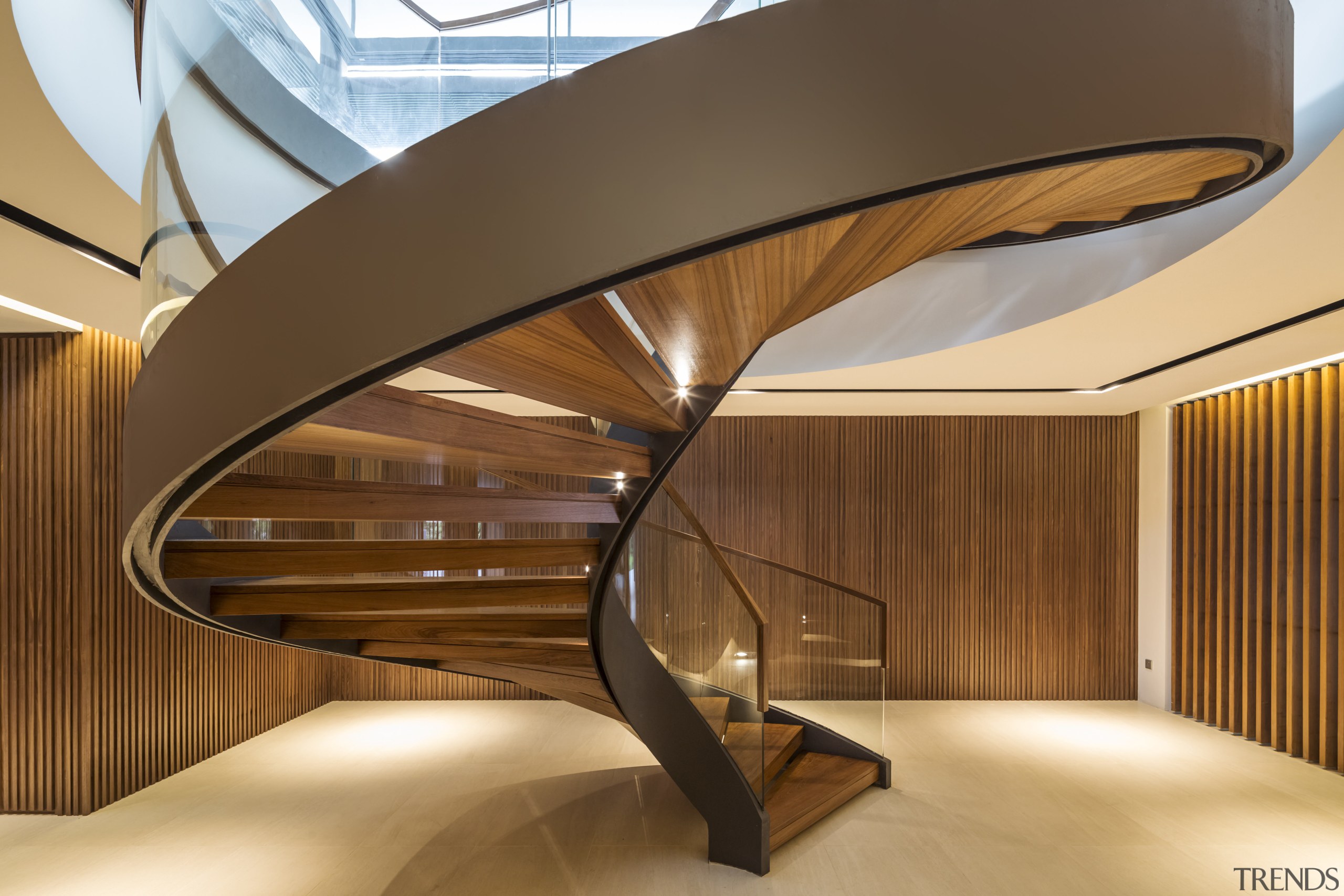 A timber-lined lobby containing a dramatic steel and architecture, ceiling, daylighting, interior design, lobby, product design, stairs, wood, brown