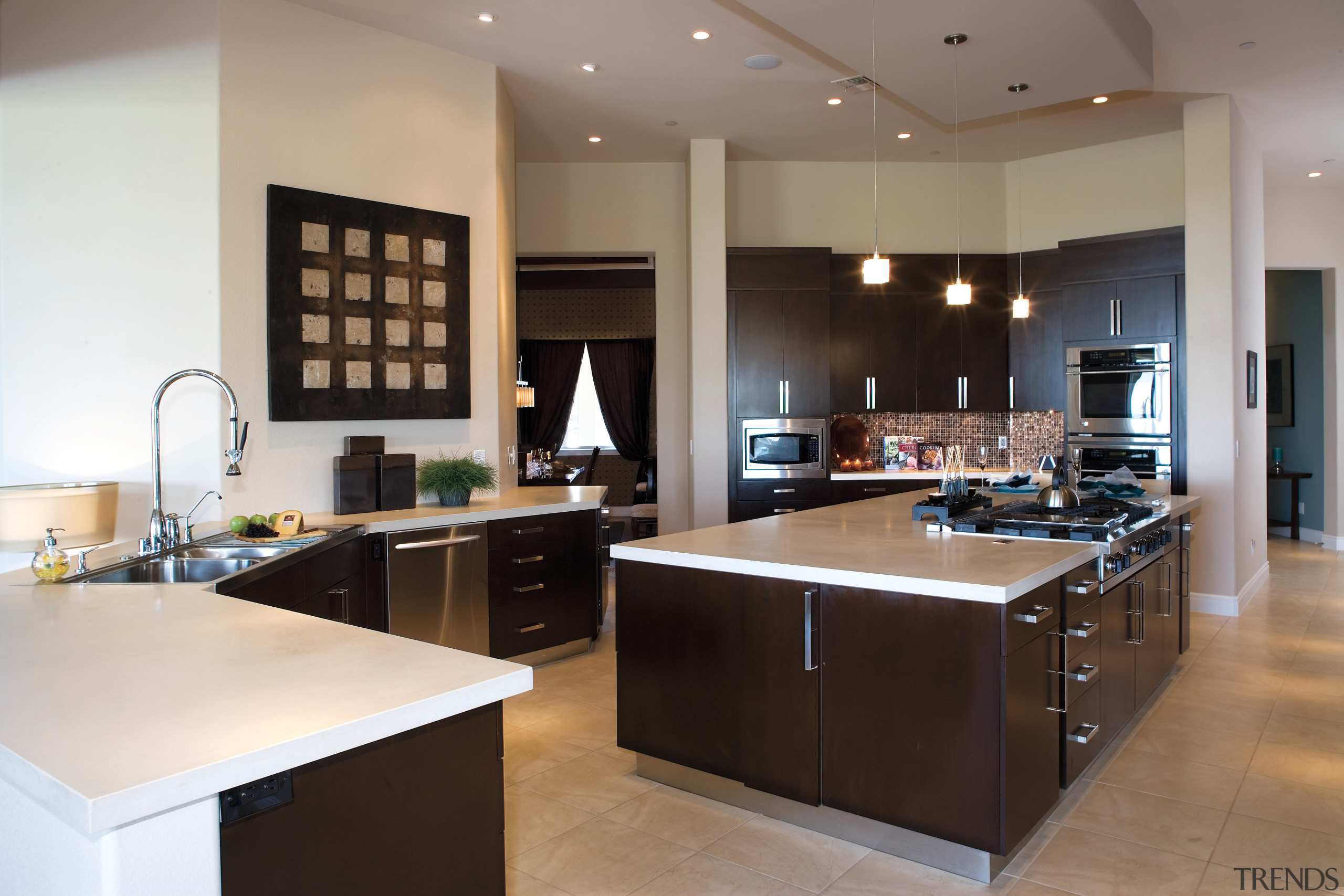 A view of the kitchen featuring tiled flooring, cabinetry, countertop, cuisine classique, interior design, kitchen, room, gray, black