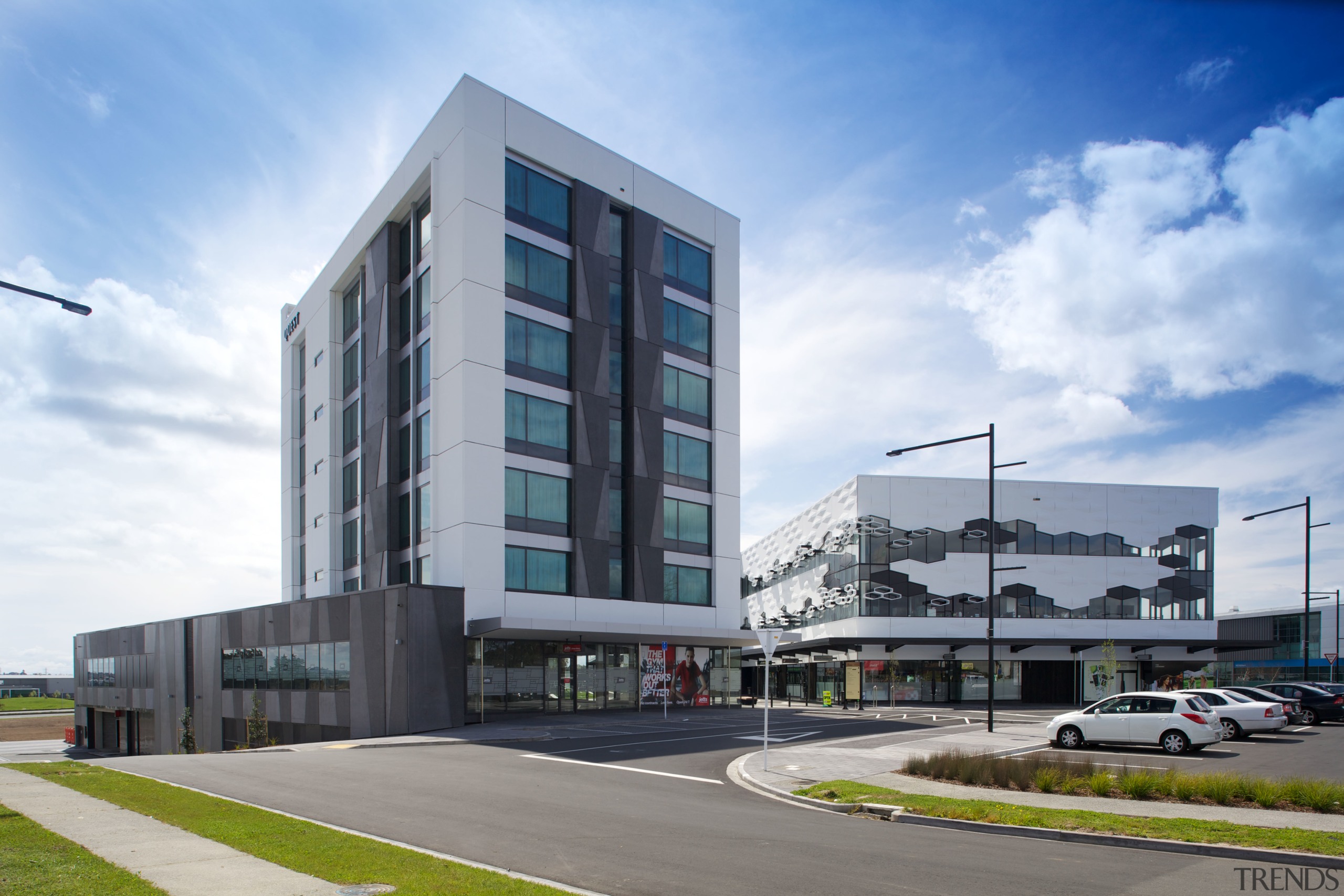 The Crossing at Highbrook Business Park was constructed apartment, architecture, building, commercial building, condominium, corporate headquarters, elevation, facade, headquarters, metropolitan area, mixed use, neighbourhood, real estate, residential area, sky, white