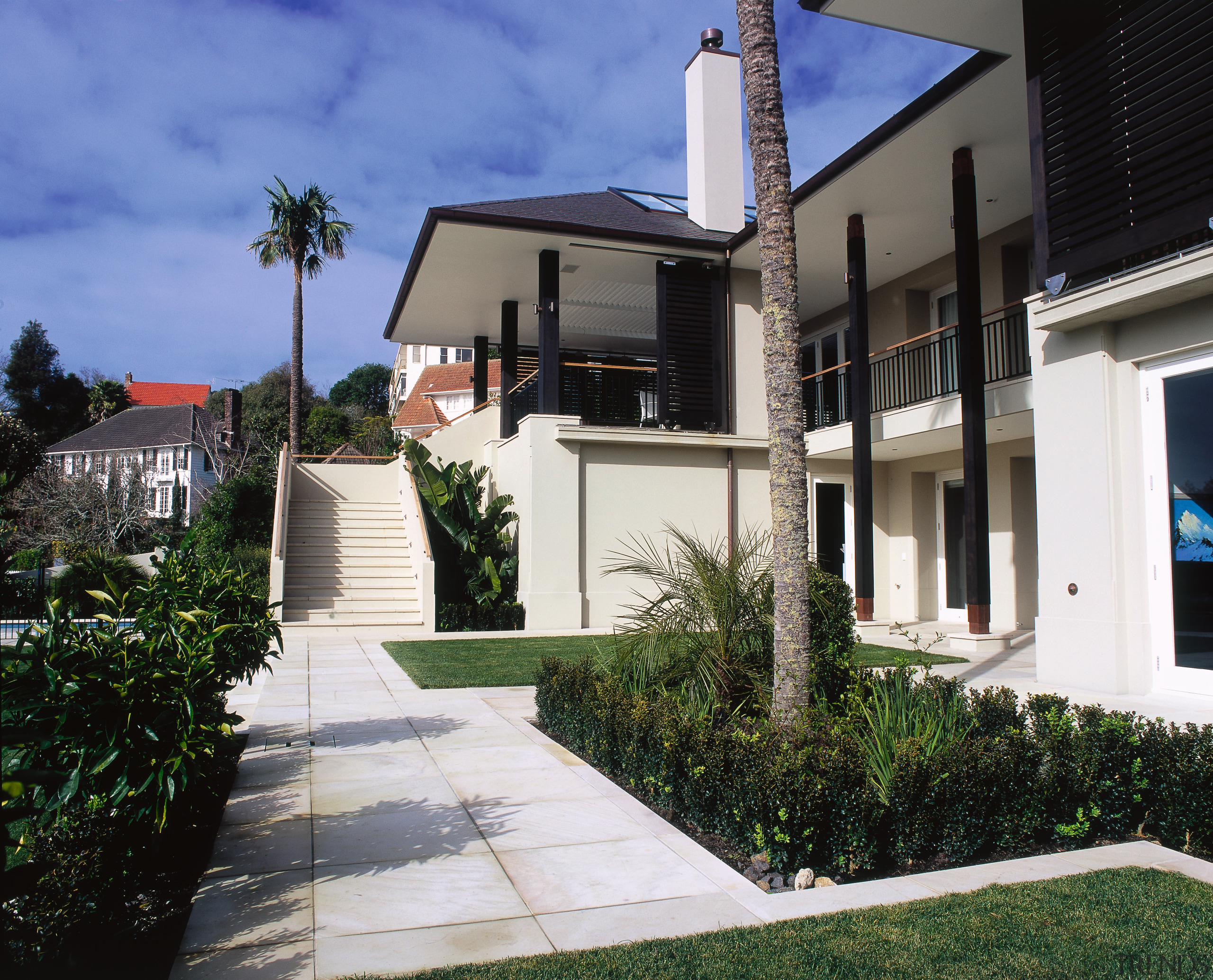 Large cream coloured stone tiles lead to front apartment, building, condominium, estate, facade, home, house, neighbourhood, property, real estate, residential area, villa, black