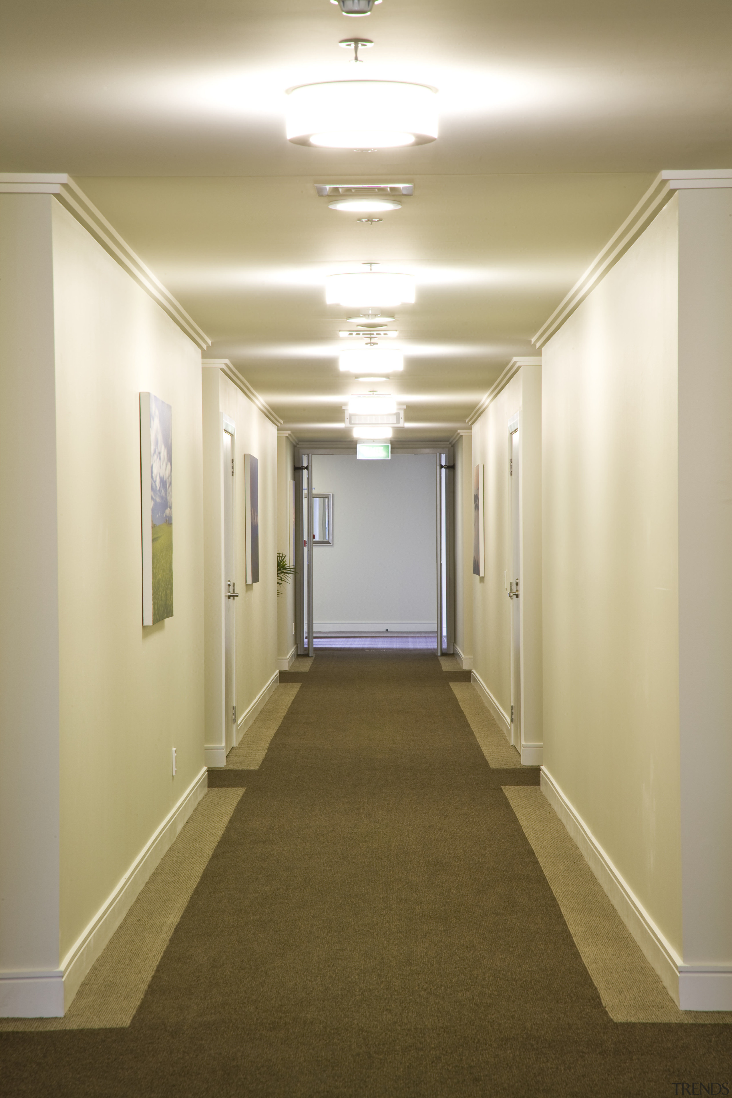 View of a hallway with lighting installed by ceiling, daylighting, floor, flooring, hall, home, interior design, lighting, real estate, room, wall, white, brown