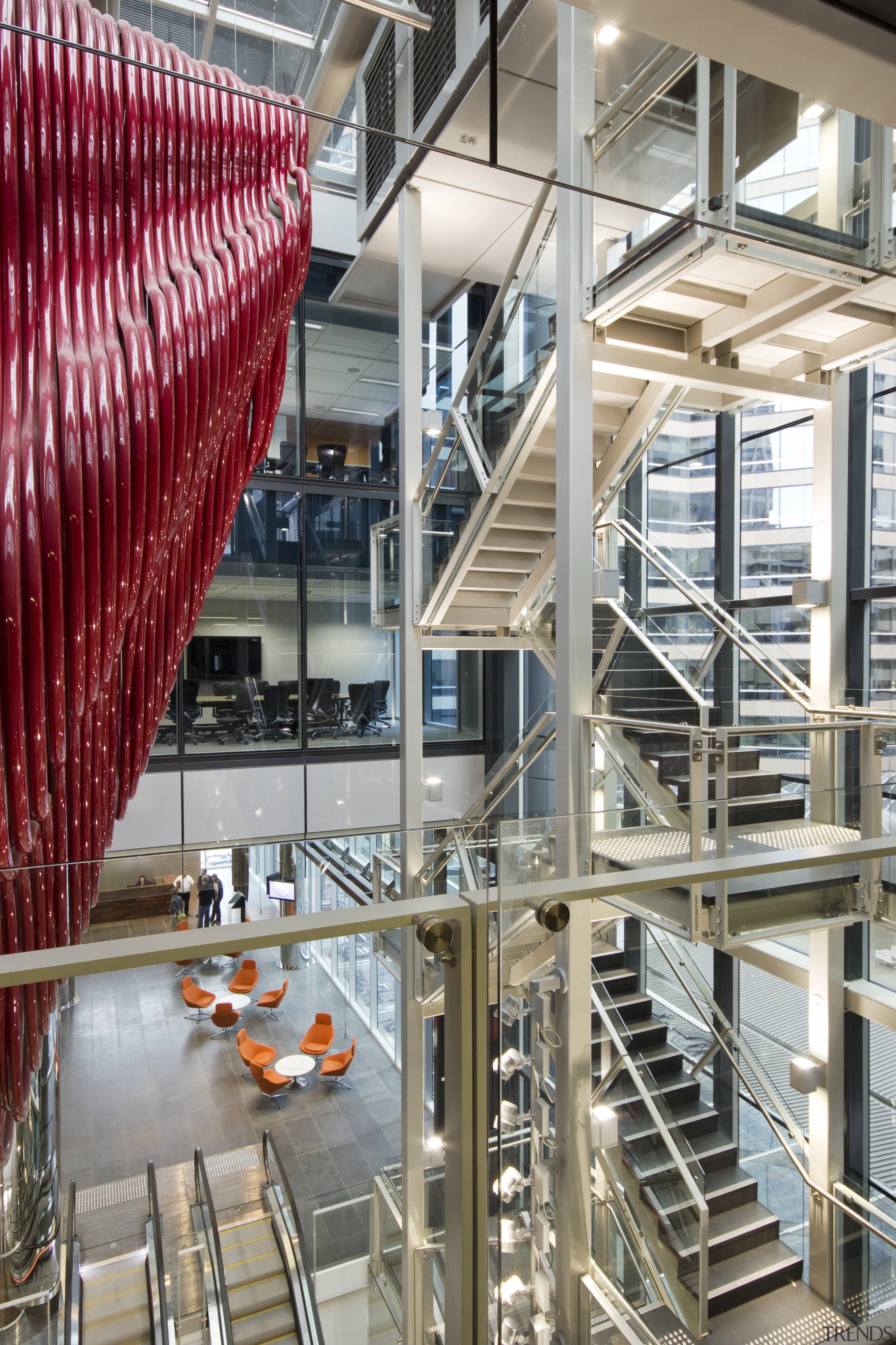 An exposed stairwell activates the atrium in the architecture, building, facade, structure, gray