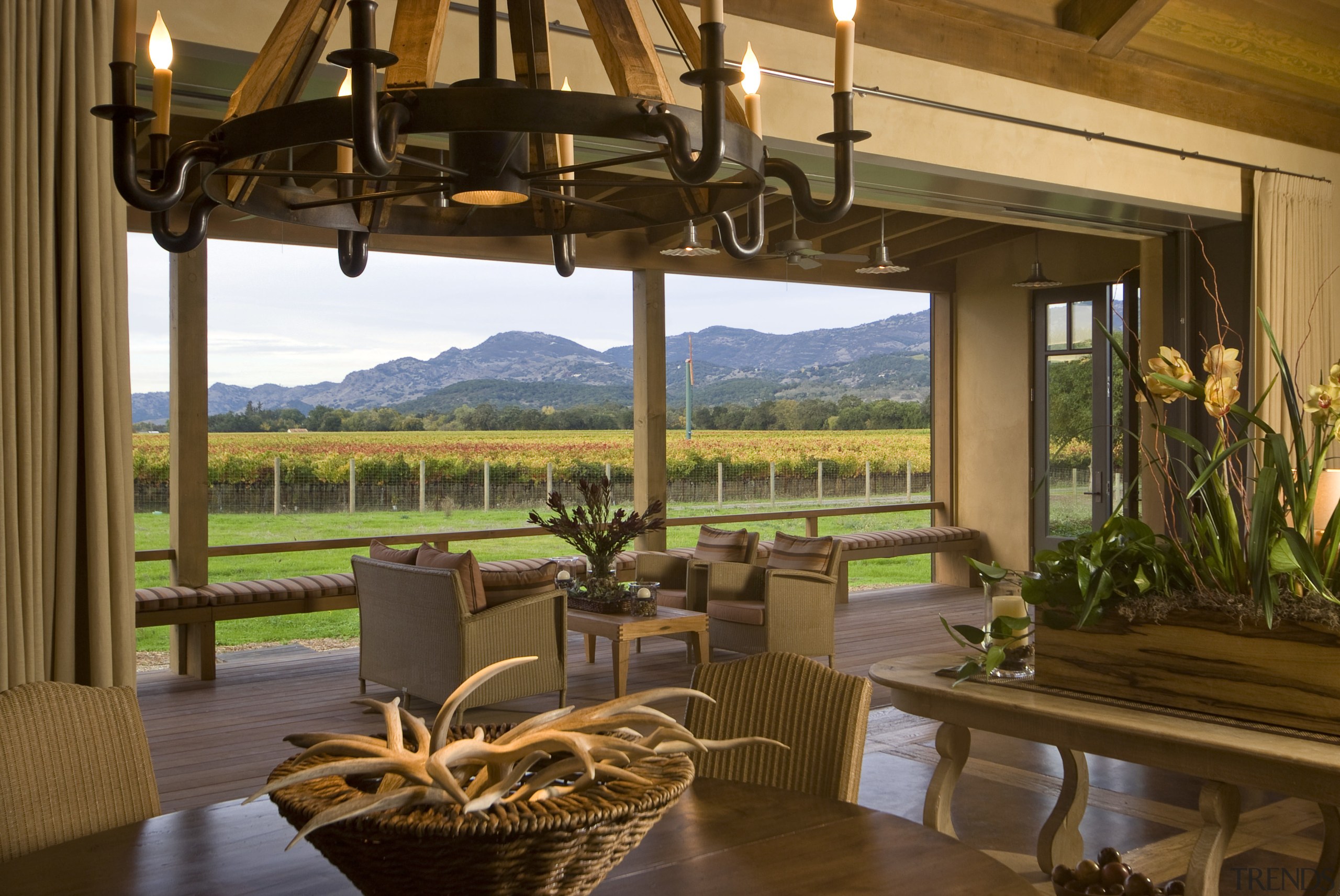 View of kitchen, great room and wine cellar. estate, home, interior design, living room, property, real estate, resort, window, brown