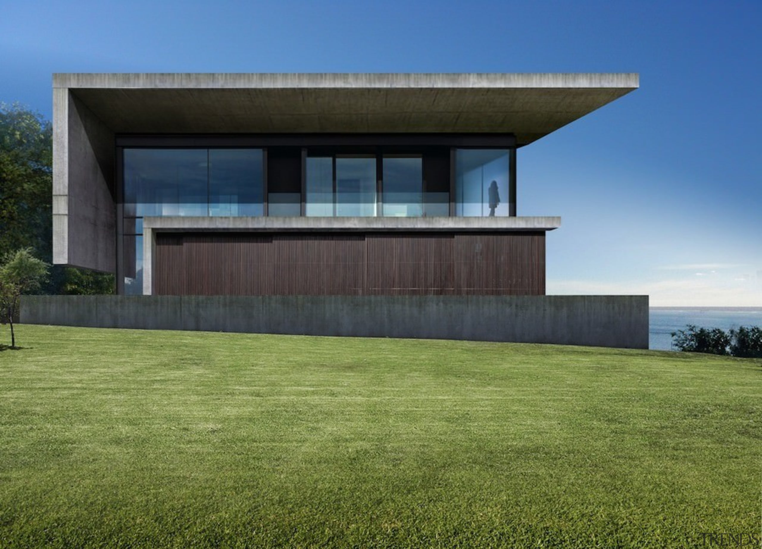 A view of the home from the lawn architecture, building, corporate headquarters, elevation, estate, facade, grass, home, house, lawn, property, real estate, residential area, sky, villa