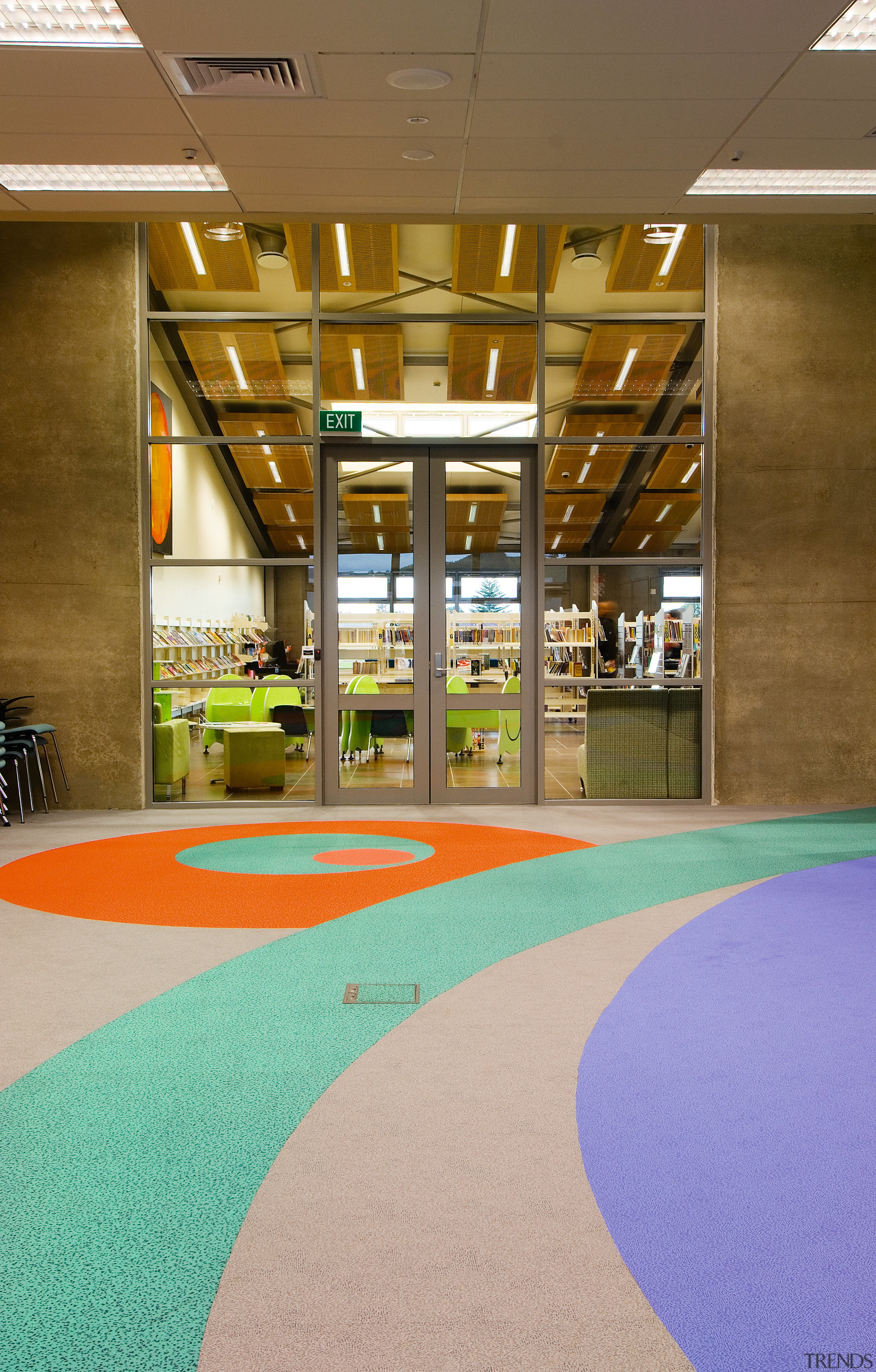 A view of the Papamoa library constructed by architecture, floor, flooring, interior design, leisure, leisure centre, real estate, brown