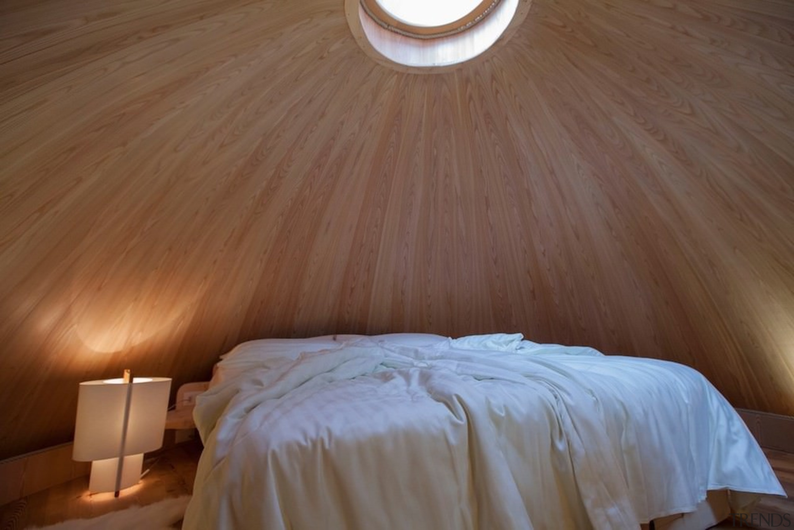 This skylight illuminates the bedroom - This skylight bed, bedroom, ceiling, daylighting, floor, flooring, interior design, light, lighting, plaster, room, suite, wall, wood, wood stain, brown