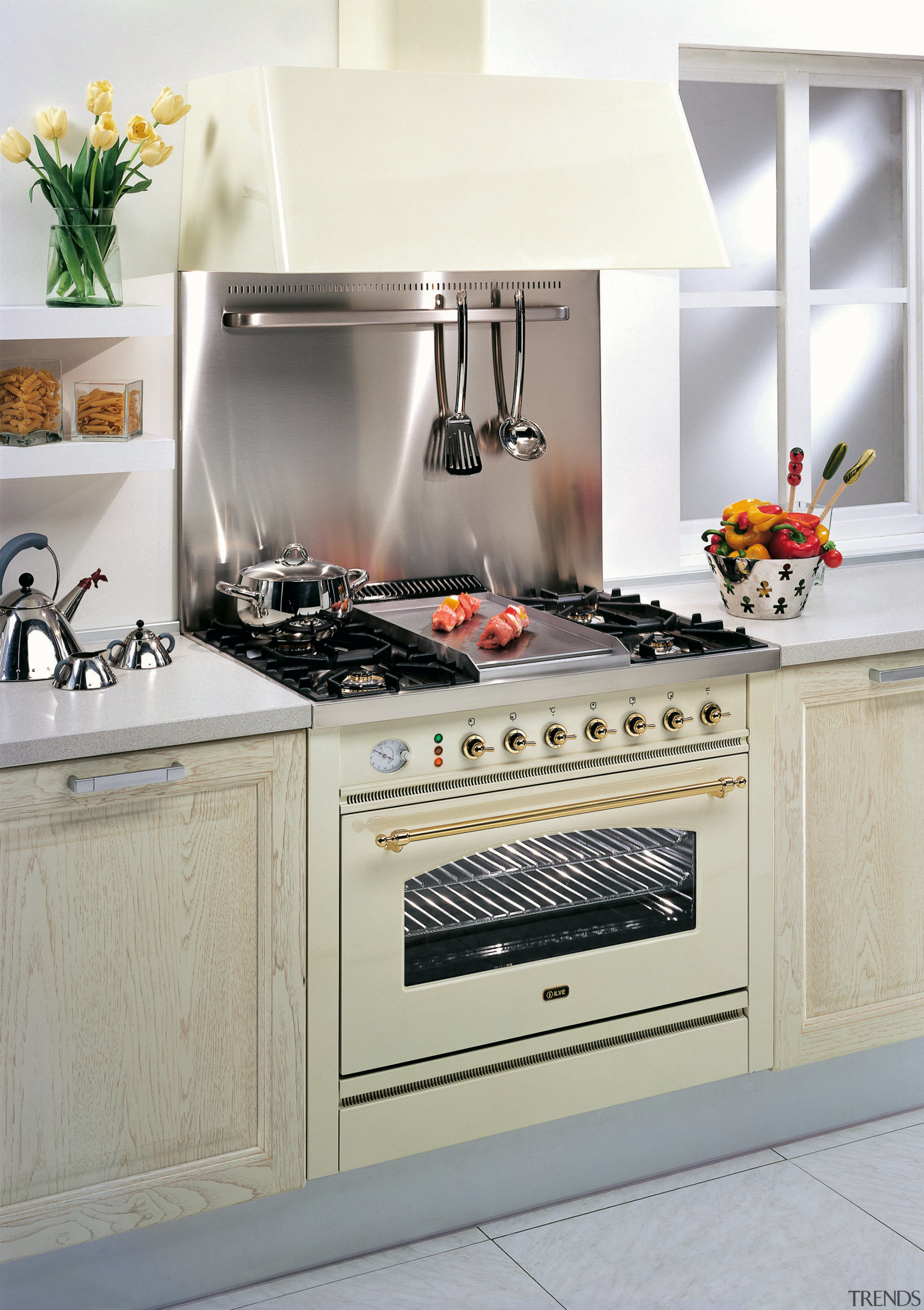 Ilve's Quadra and Nostalgie gas ovens offer expansive countertop, cuisine classique, furniture, gas stove, home appliance, kitchen, kitchen appliance, kitchen stove, major appliance, microwave oven, oven, refrigerator, small appliance, gray, white