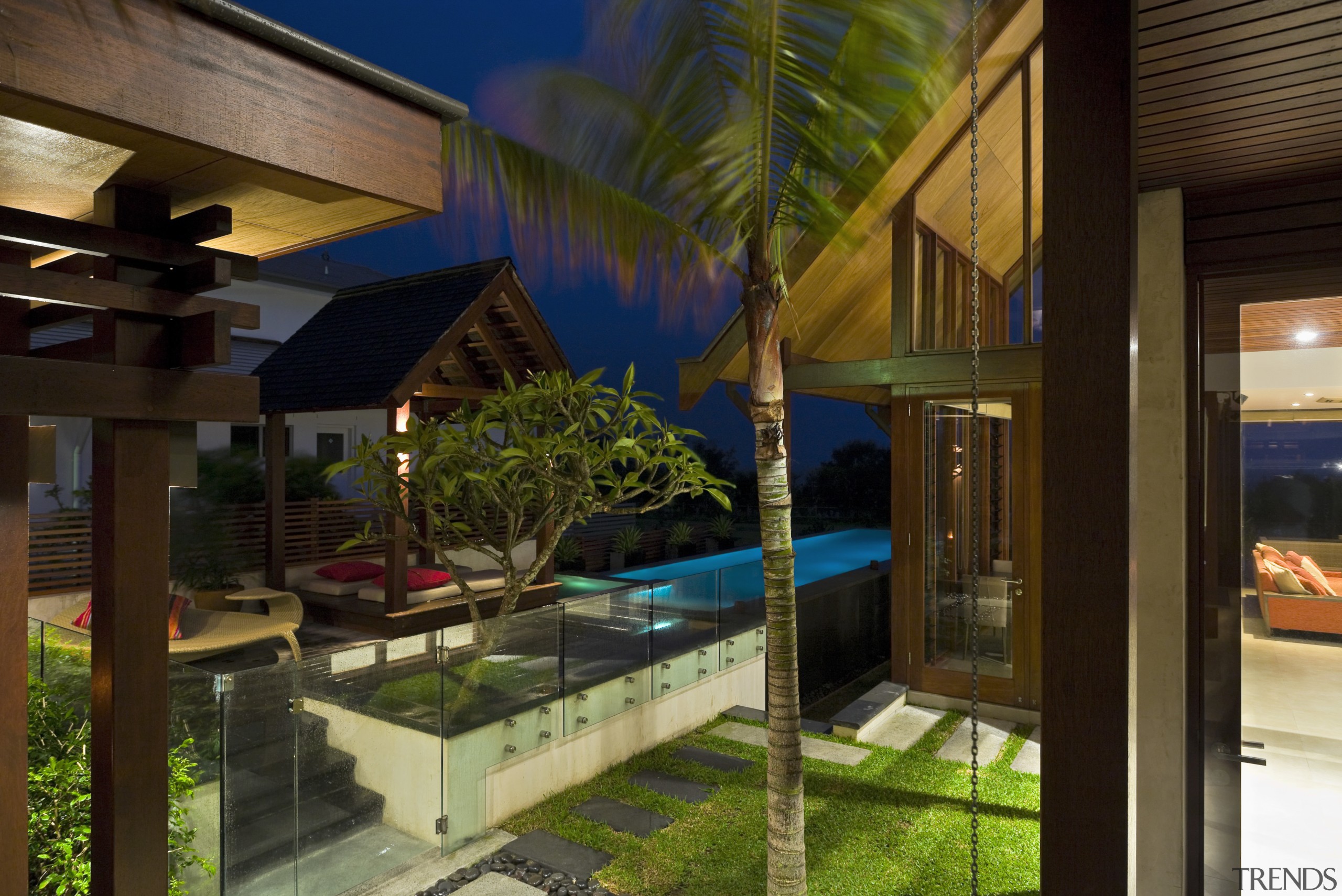 View of outdoor area and pool with landscaping, architecture, estate, home, house, property, real estate, resort, brown, black