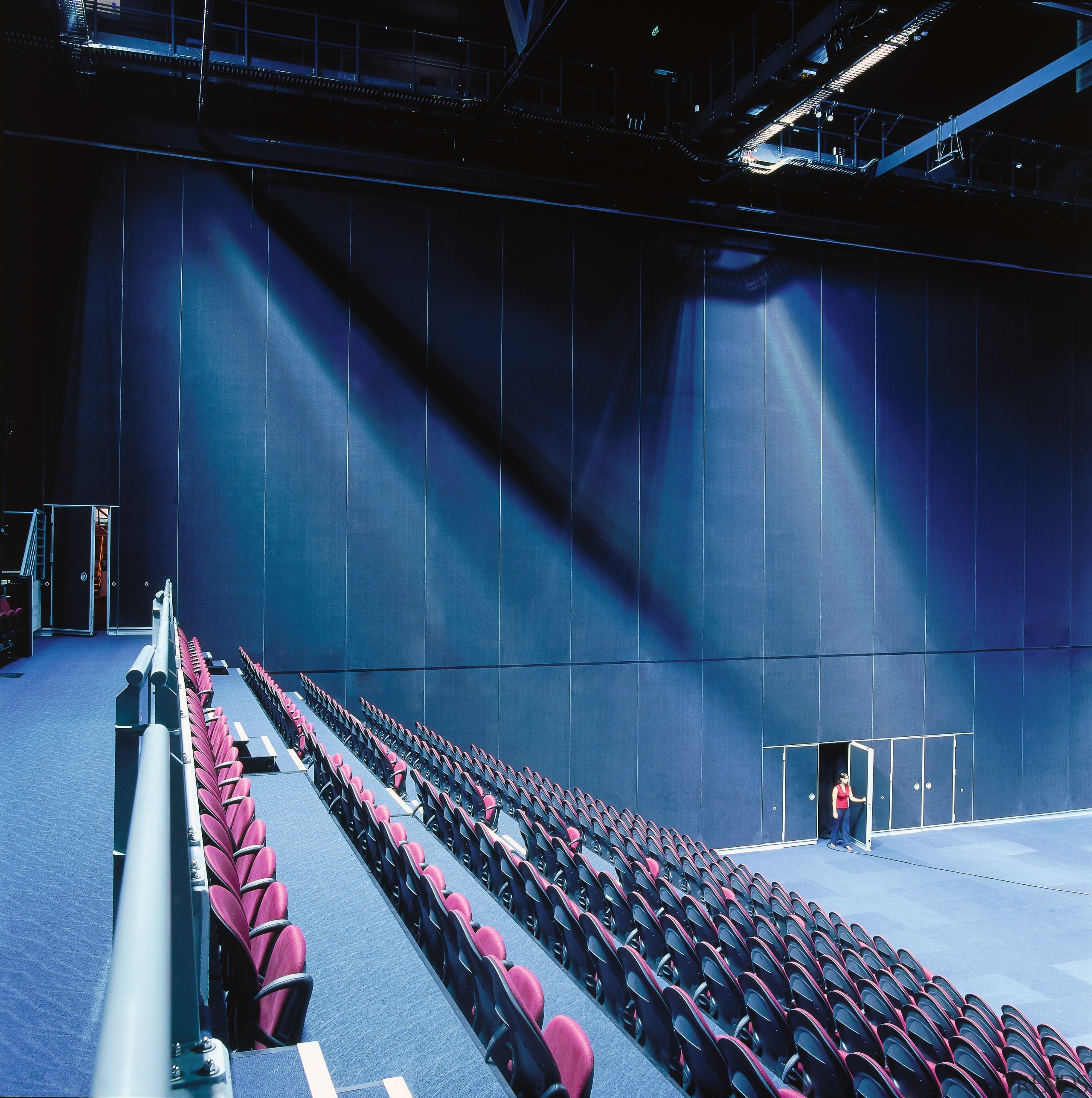 Seating in arena with 14m high movable wall architecture, auditorium, performing arts center, stage, structure, theatre, blue