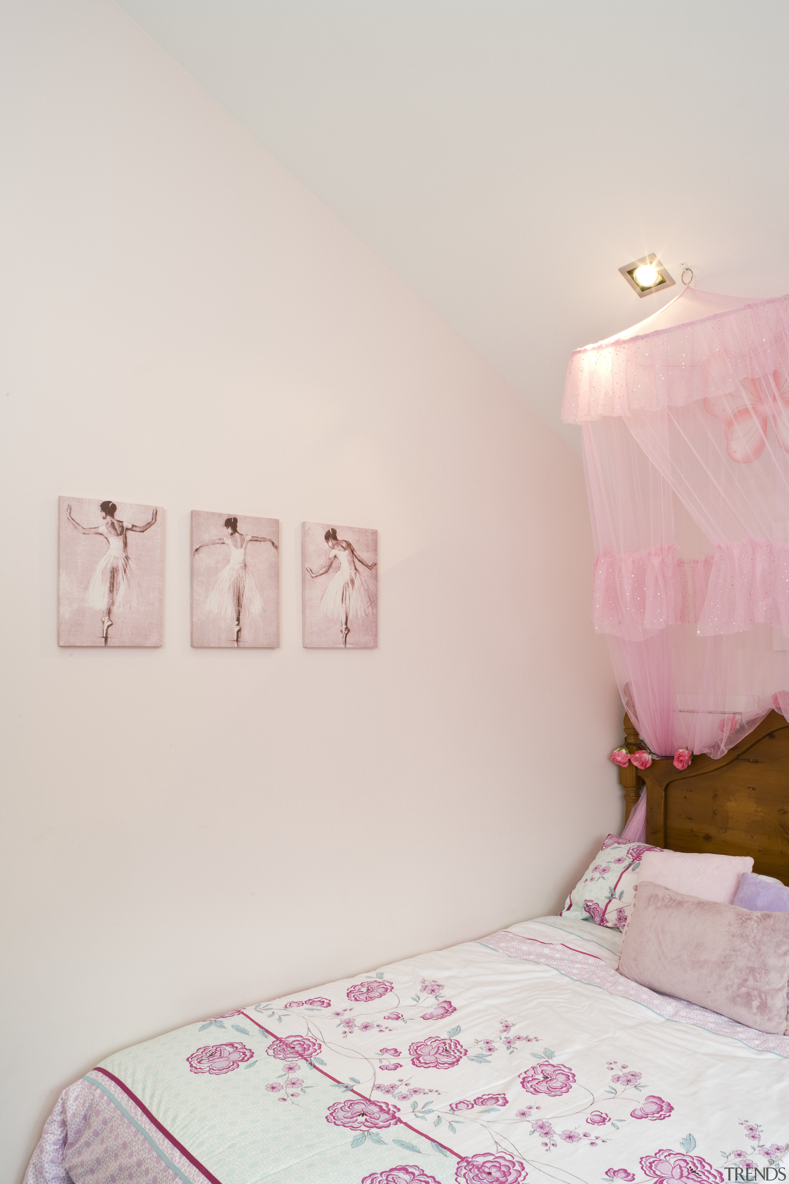 View of a bedroom at this ICR designed bed, bed sheet, bedding, bedroom, floor, furniture, interior design, pink, product, room, textile, wall, white