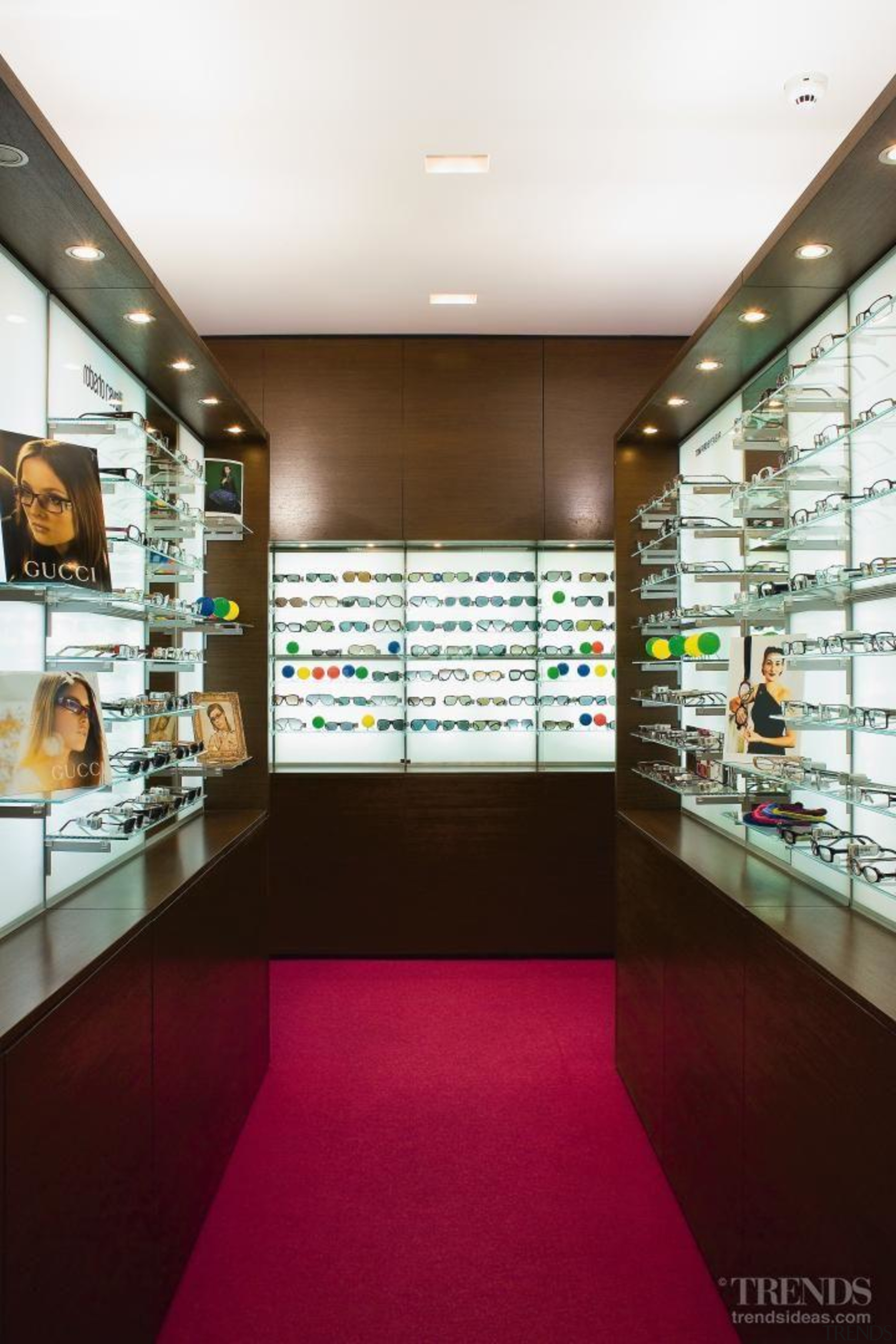 Island displays offer some privacy for shoppers. interior design, lobby, retail, red, white