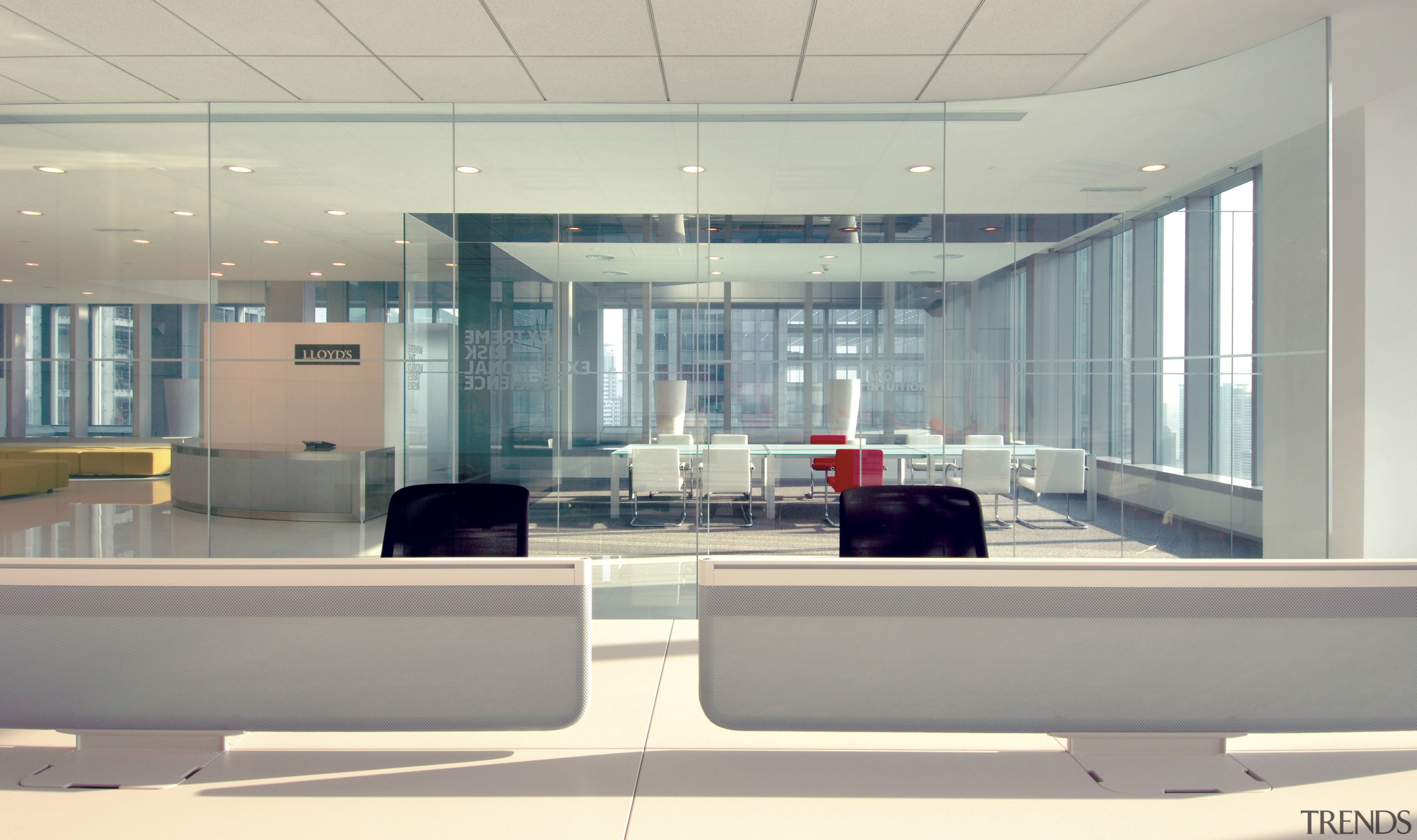 Interior view of Lloyd's Reinsurance Co. featuring stone daylighting, glass, interior design, lobby, office, gray, white
