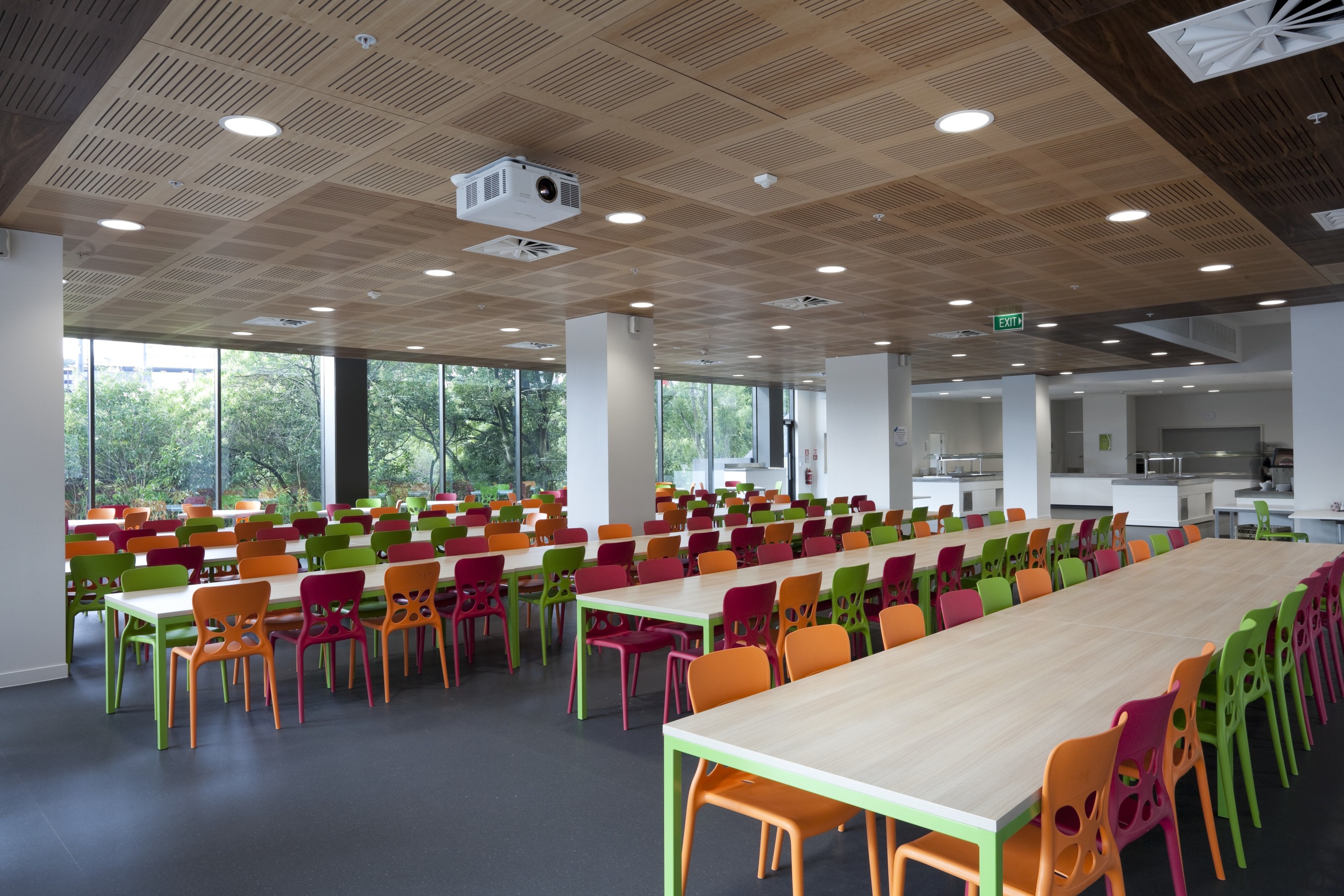 View of dining area with colourful chairs. - architecture, cafeteria, classroom, conference hall, function hall, institution, interior design, table, gray