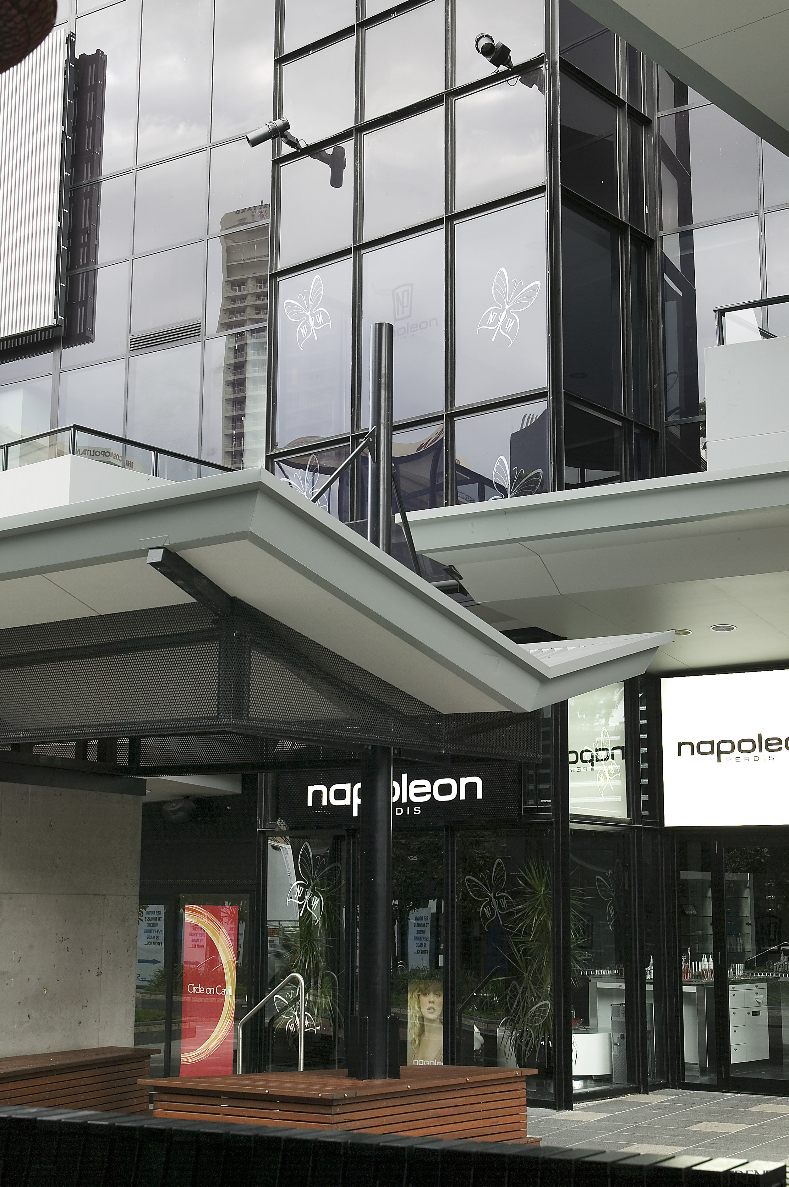 A view of the structural steel manufactured and architecture, building, condominium, facade, glass, window, black, gray