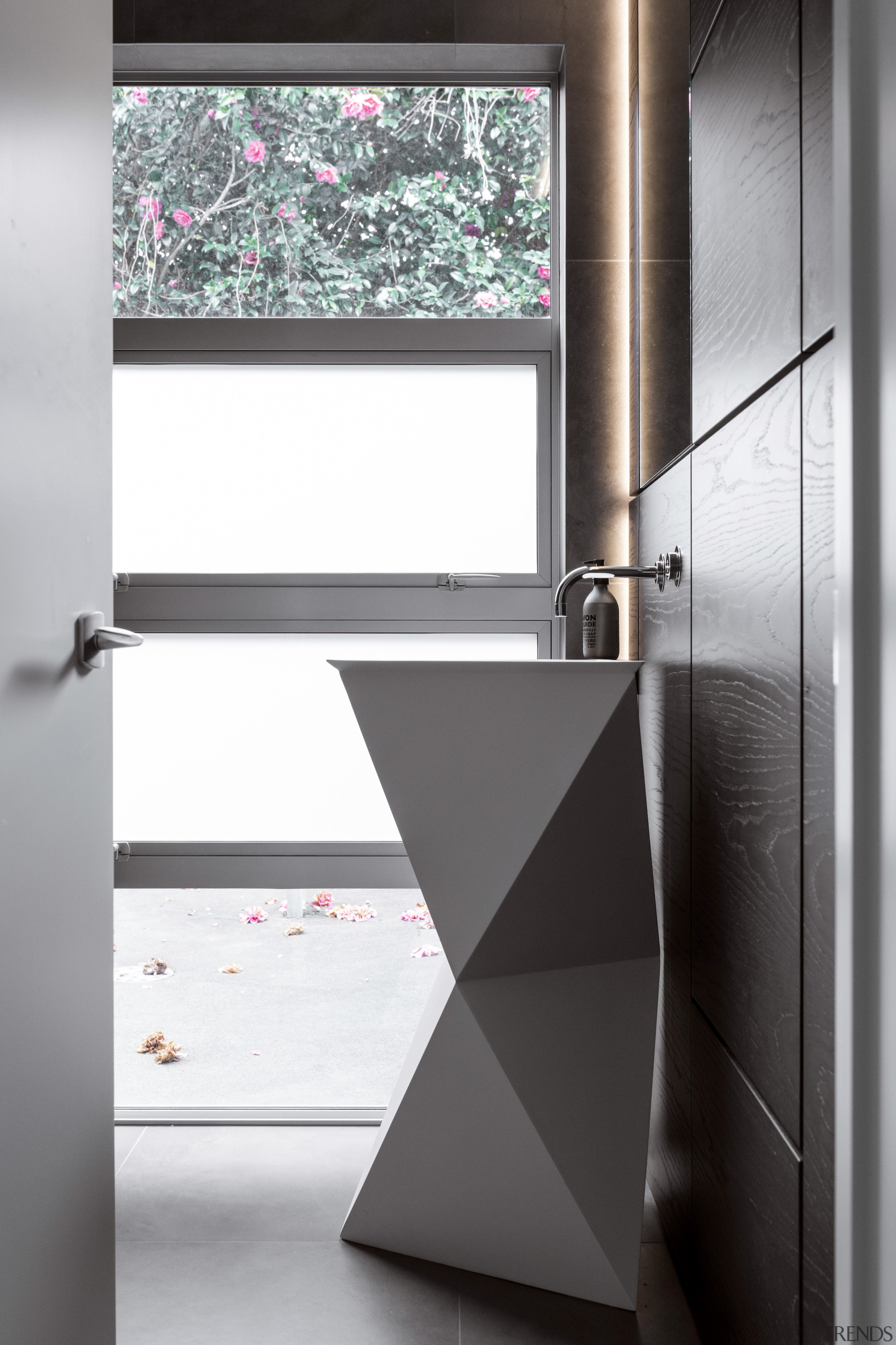 Frosted glass panes admit light while preserving occupant 