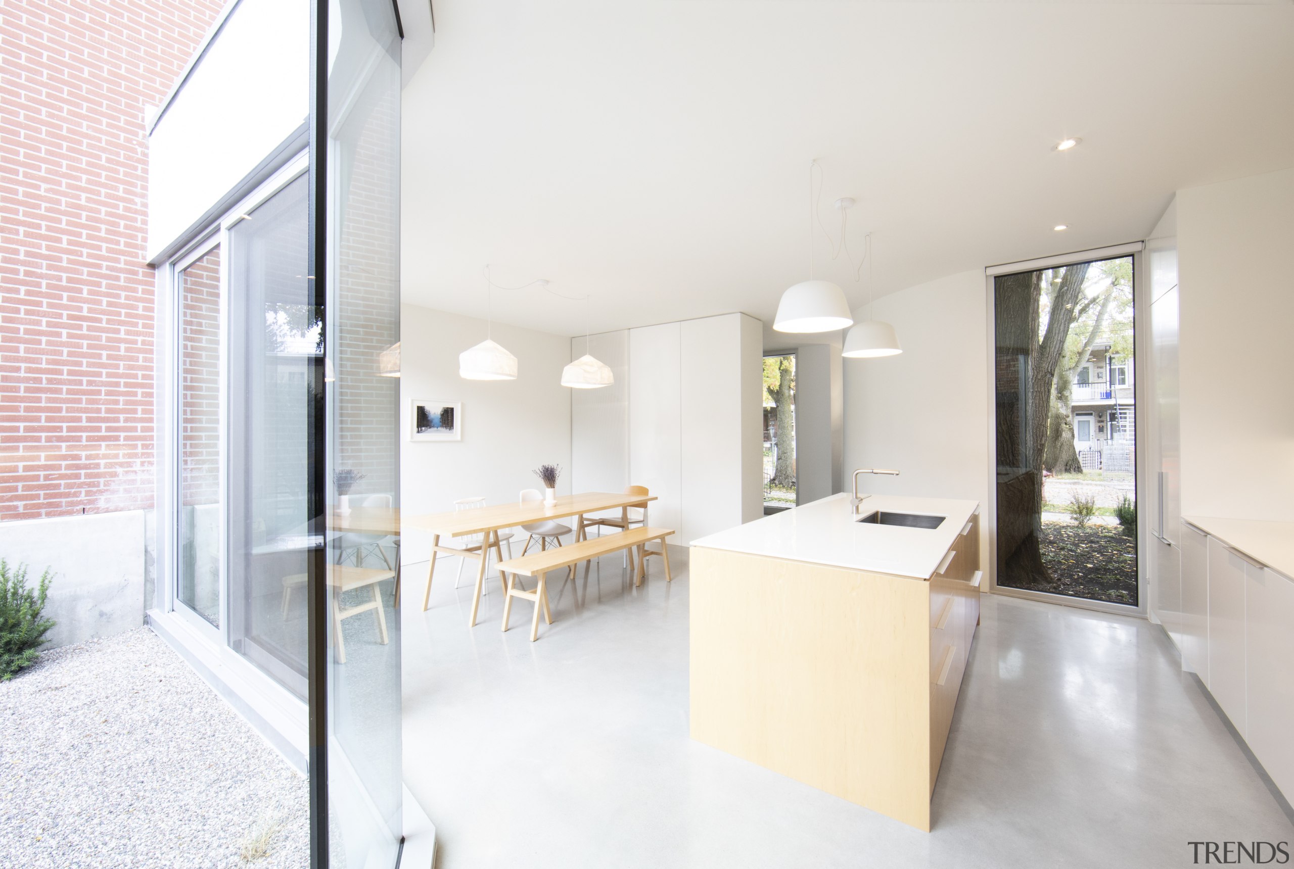 The new kitchen is flooded with light. - 