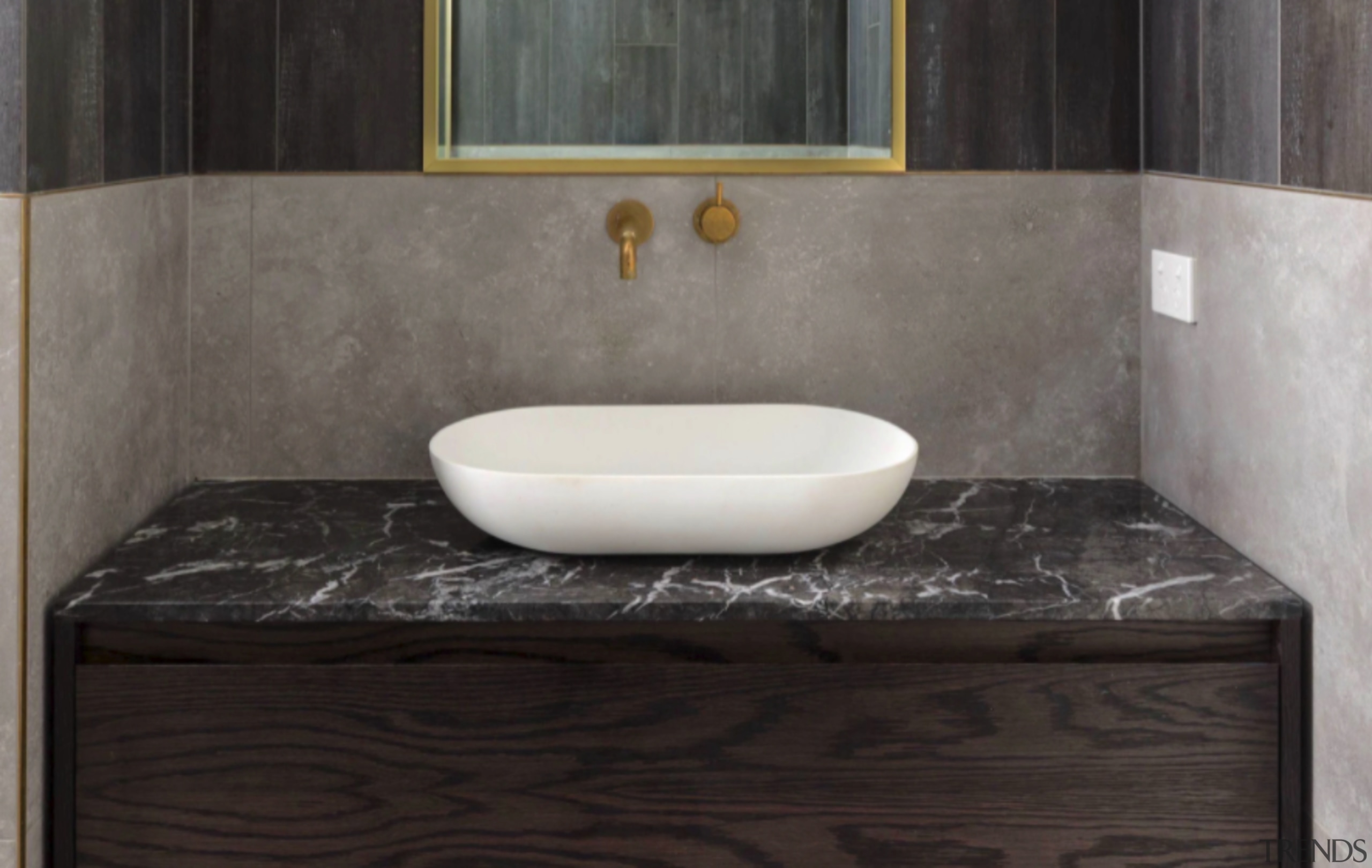 Oak cabinet, marble vanity top and brass detailing 
