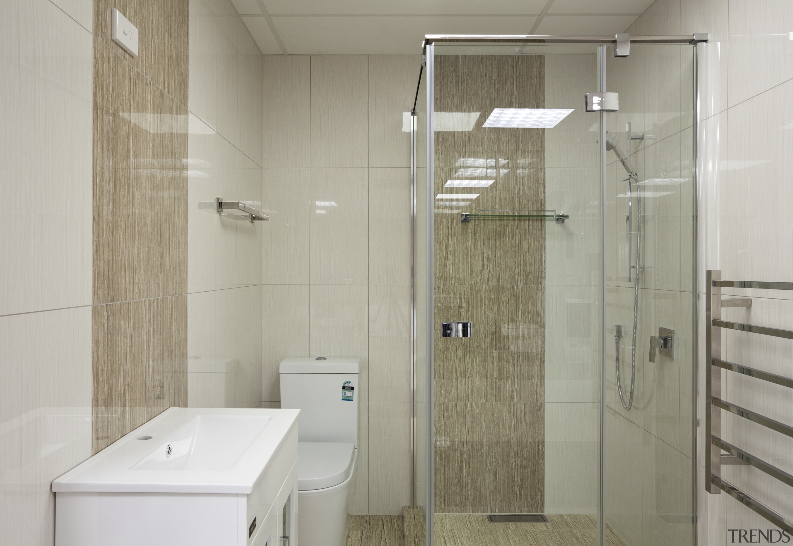 Bathroom with beige and cream walls, white basin bathroom, plumbing fixture, room, tile, gray