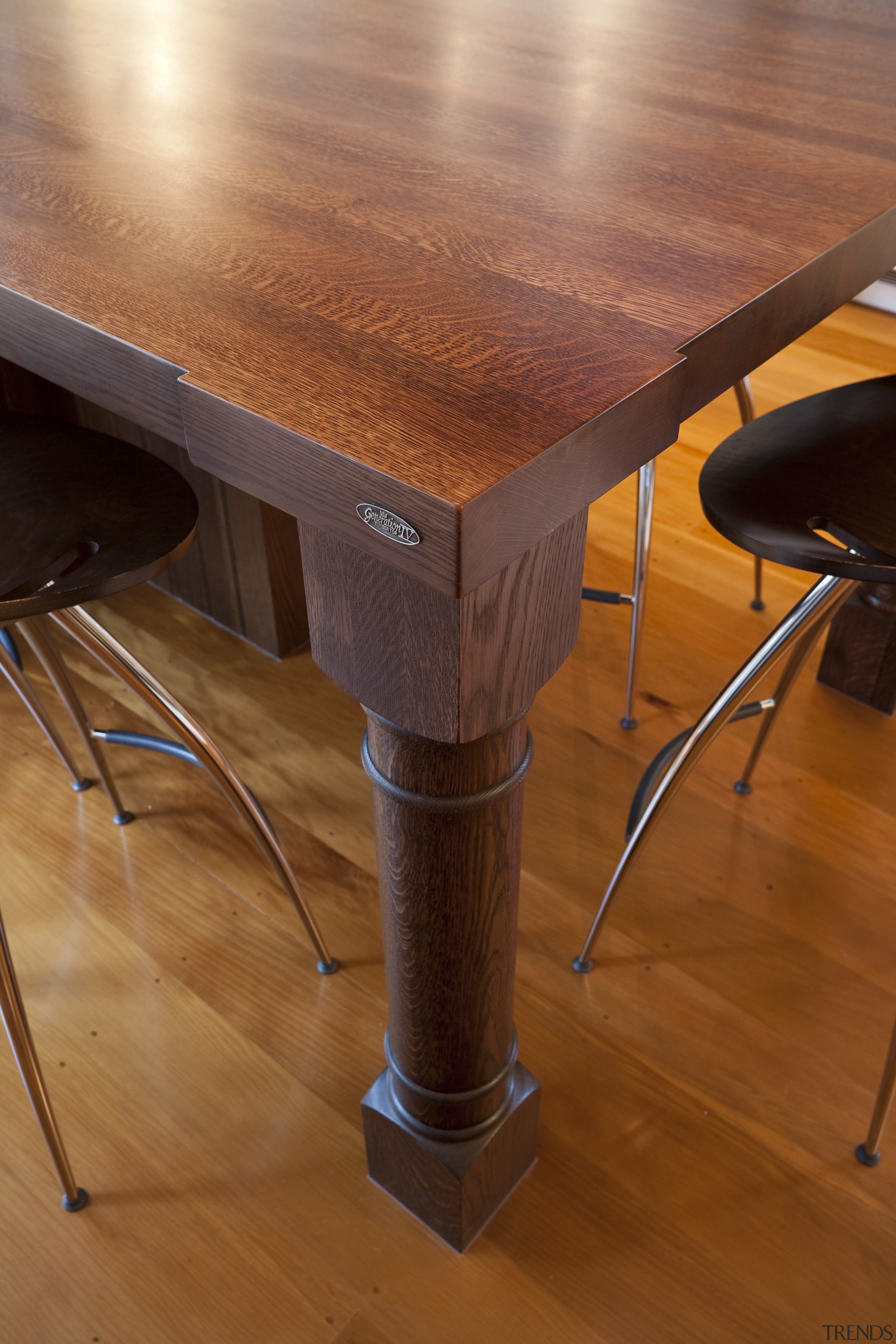 View of a kitchen designed by Nicola Cumming desk, floor, flooring, furniture, hardwood, table, wood, wood stain, brown