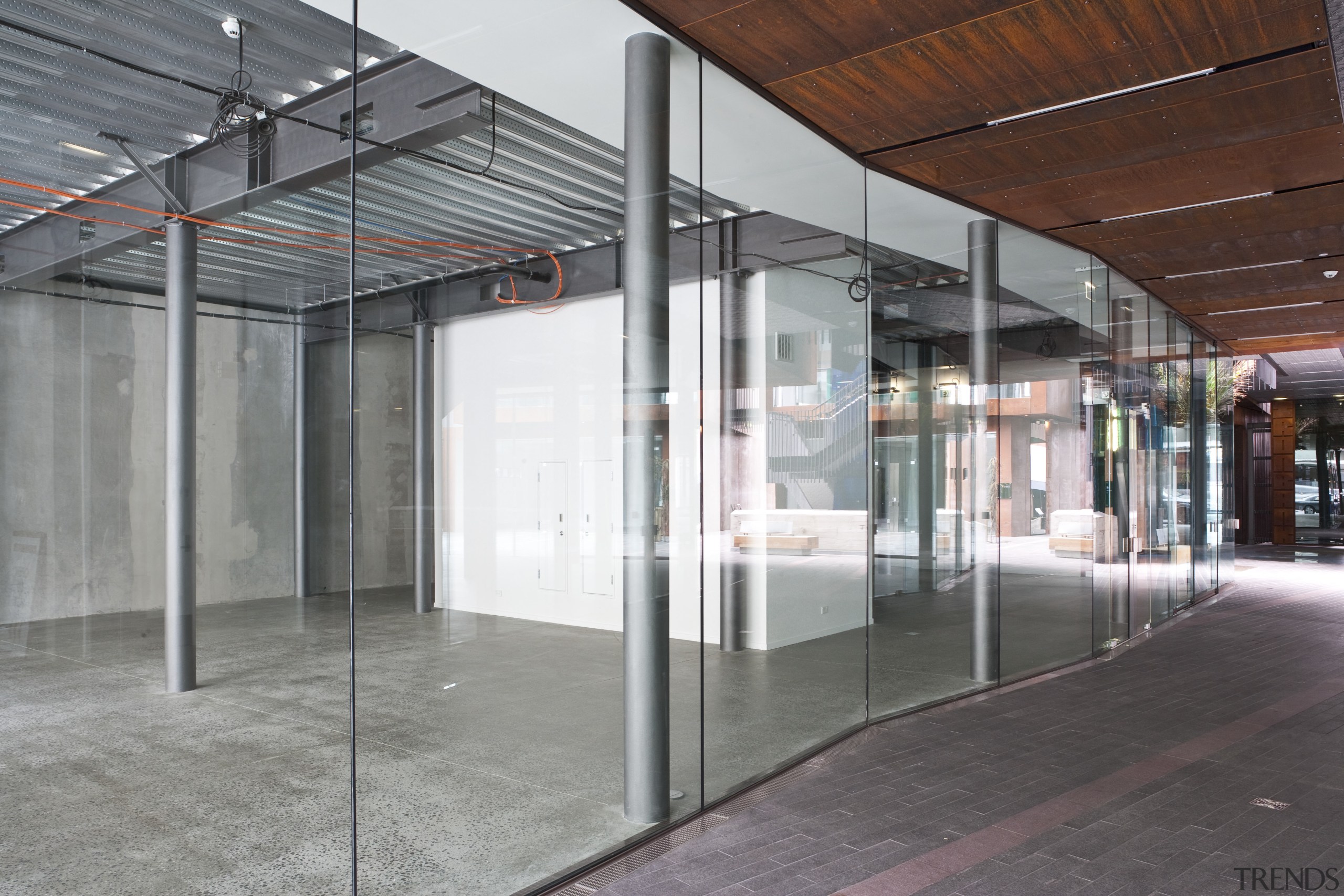 Exterior view of the Ironbank building which features floor, glass, real estate, structure, gray