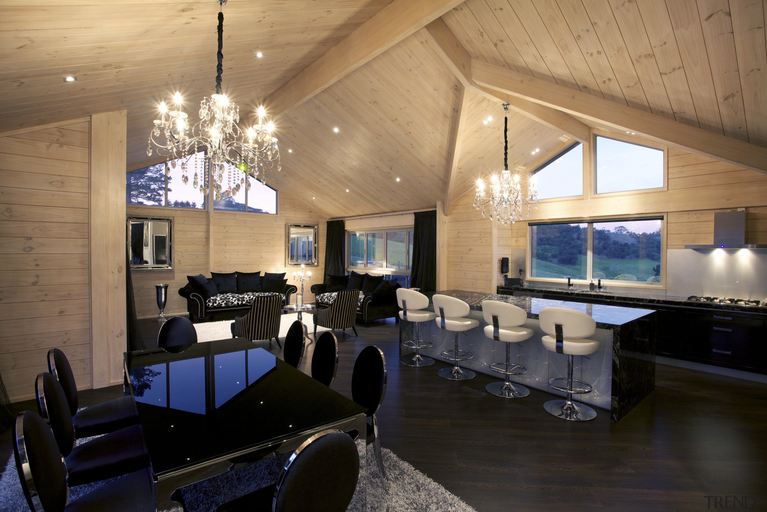 With its soaring timber lined gable roofs and architecture, ceiling, house, interior design, living room, lobby, real estate, room, black, orange