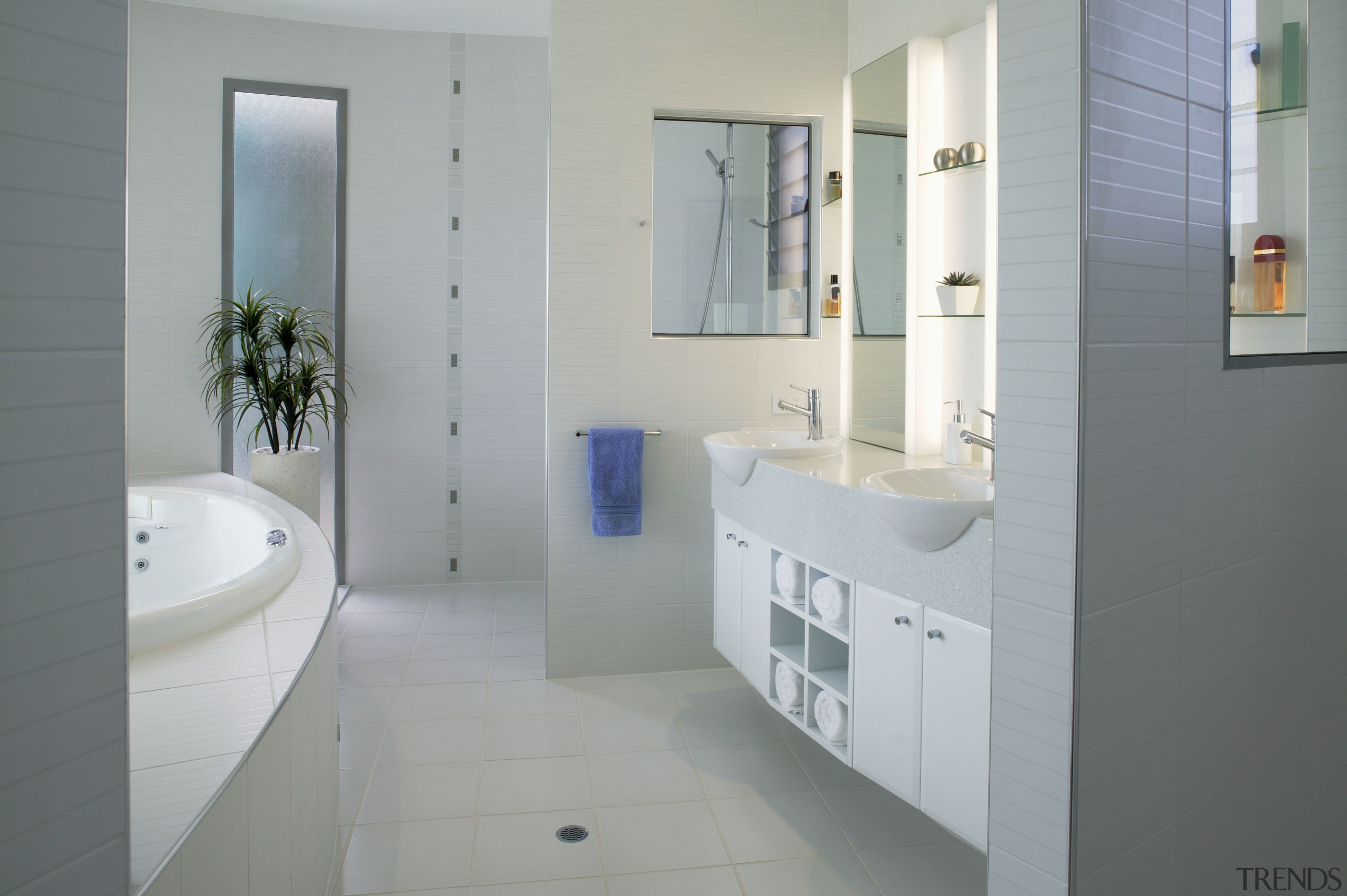 view of the bathroom featuring white tiled flooring, bathroom, bathroom accessory, bathroom cabinet, floor, home, interior design, plumbing fixture, product design, room, sink, tap, gray