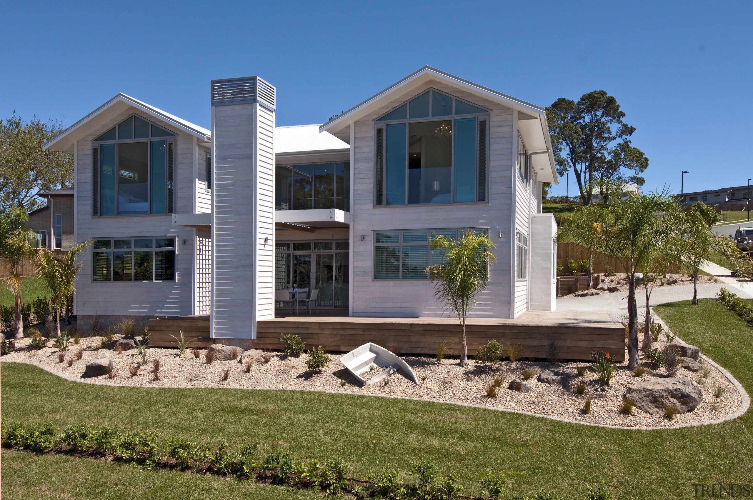 View of Jalcon home with landscaped garden. - architecture, building, cottage, elevation, estate, facade, home, house, mansion, property, real estate, residential area, villa, window, brown