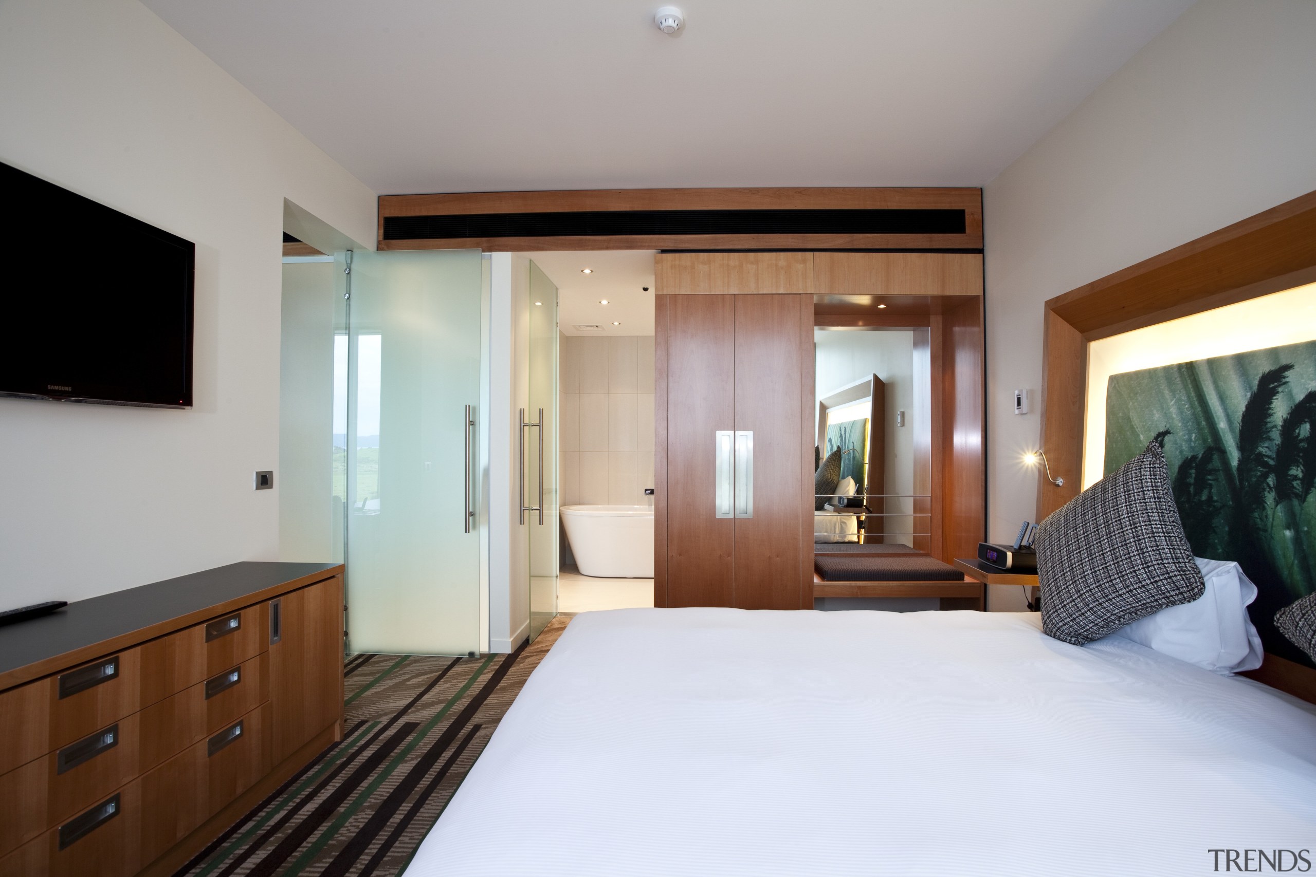 Bedroom suite in the Novotel Auckland Airport - bedroom, ceiling, estate, interior design, property, real estate, room, suite, wood, gray, white