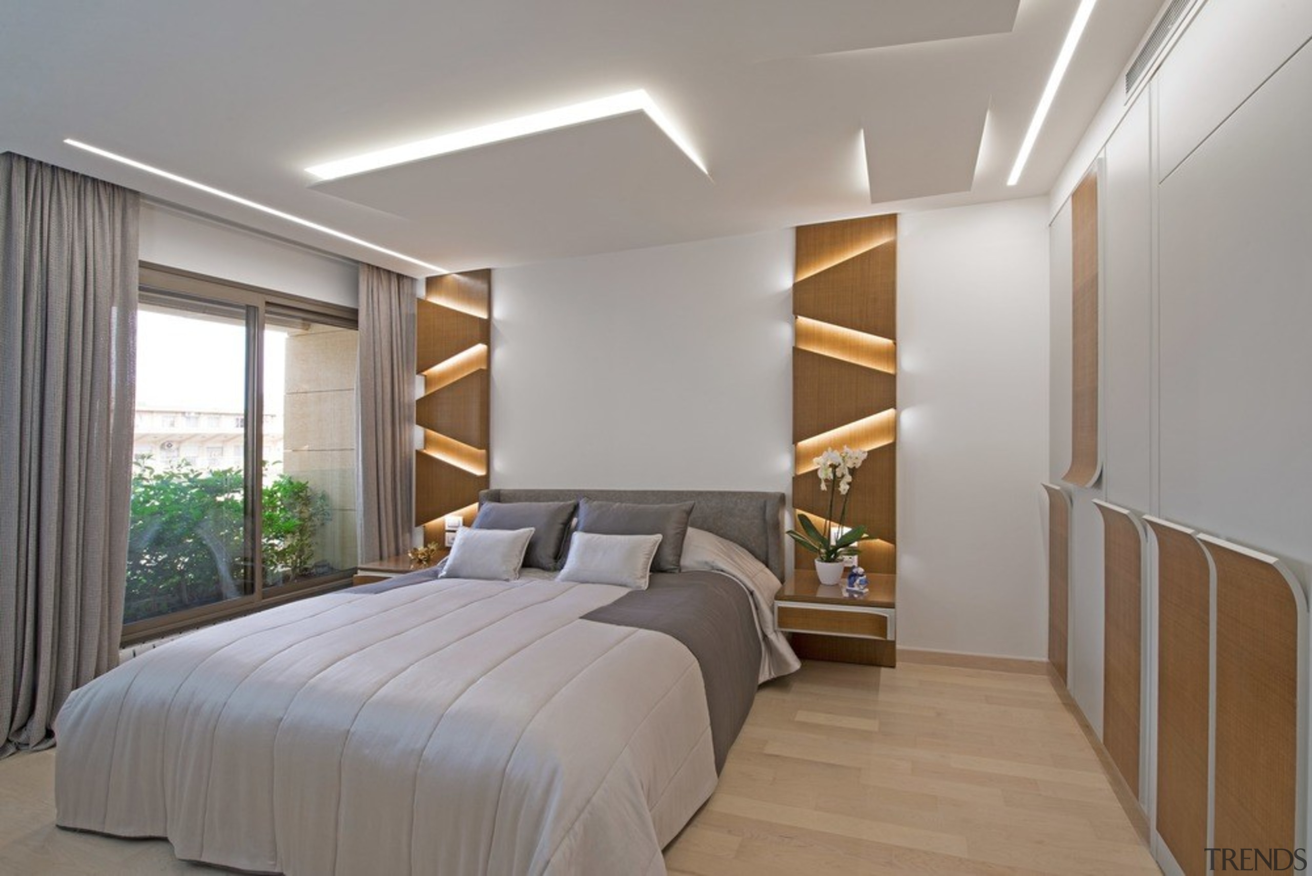The master bedroom was also created with unique apartment, architecture, bed, bed frame, bed sheet, bedding, bedroom, building, ceiling, comfort, daylighting, floor, furniture, home, house, interior design, mattress, mattress pad, plaster, property, real estate, room, suite, wall, wood flooring, gray