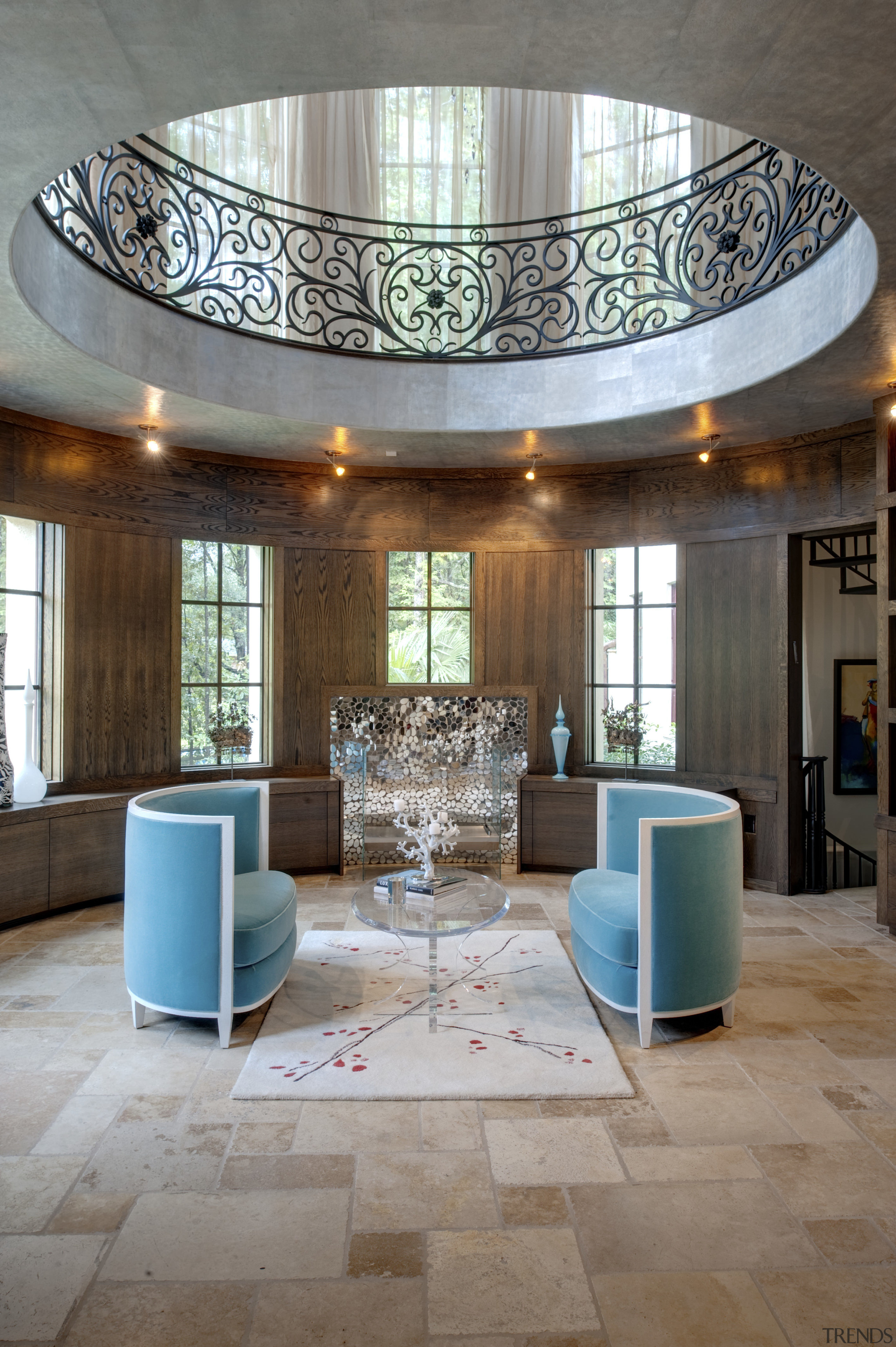 View of sitting area with two blue chairs. architecture, ceiling, daylighting, estate, floor, flooring, interior design, living room, lobby, real estate, table, gray, brown