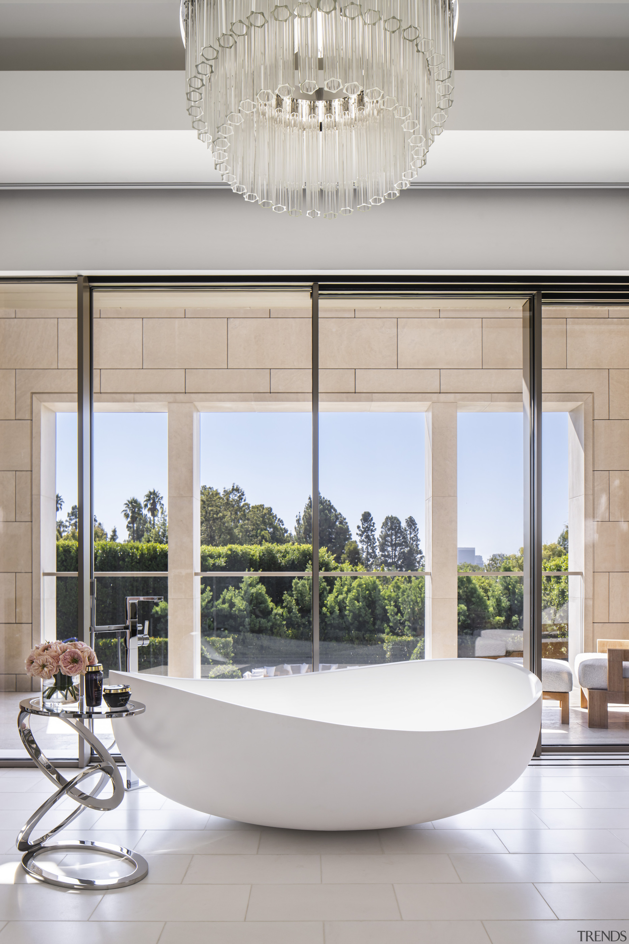 The sculptural master ensuite tub has its own 