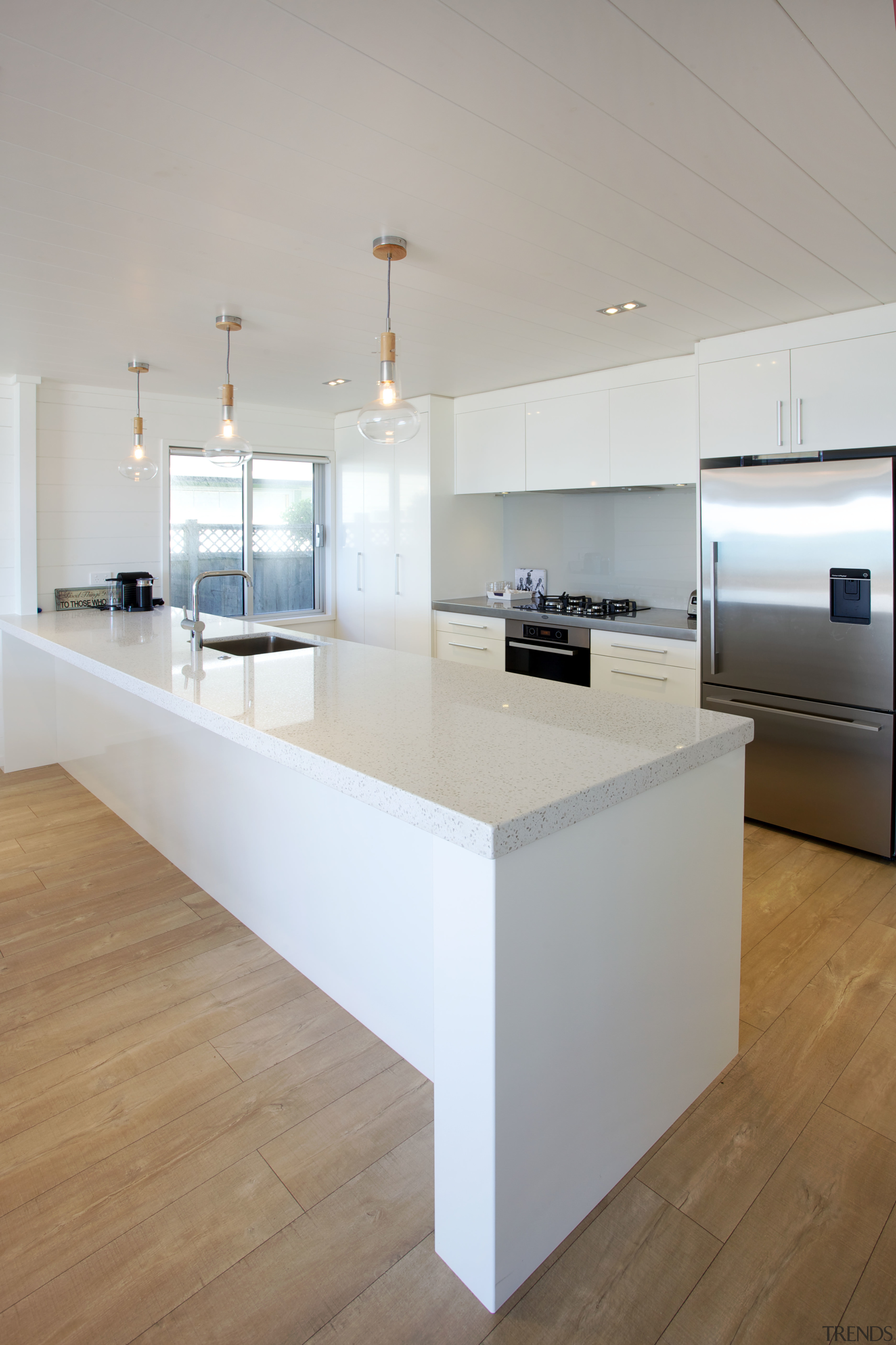 An all-white kitchen keeps the look fresh and architecture, countertop, floor, interior design, kitchen, product design, table, gray