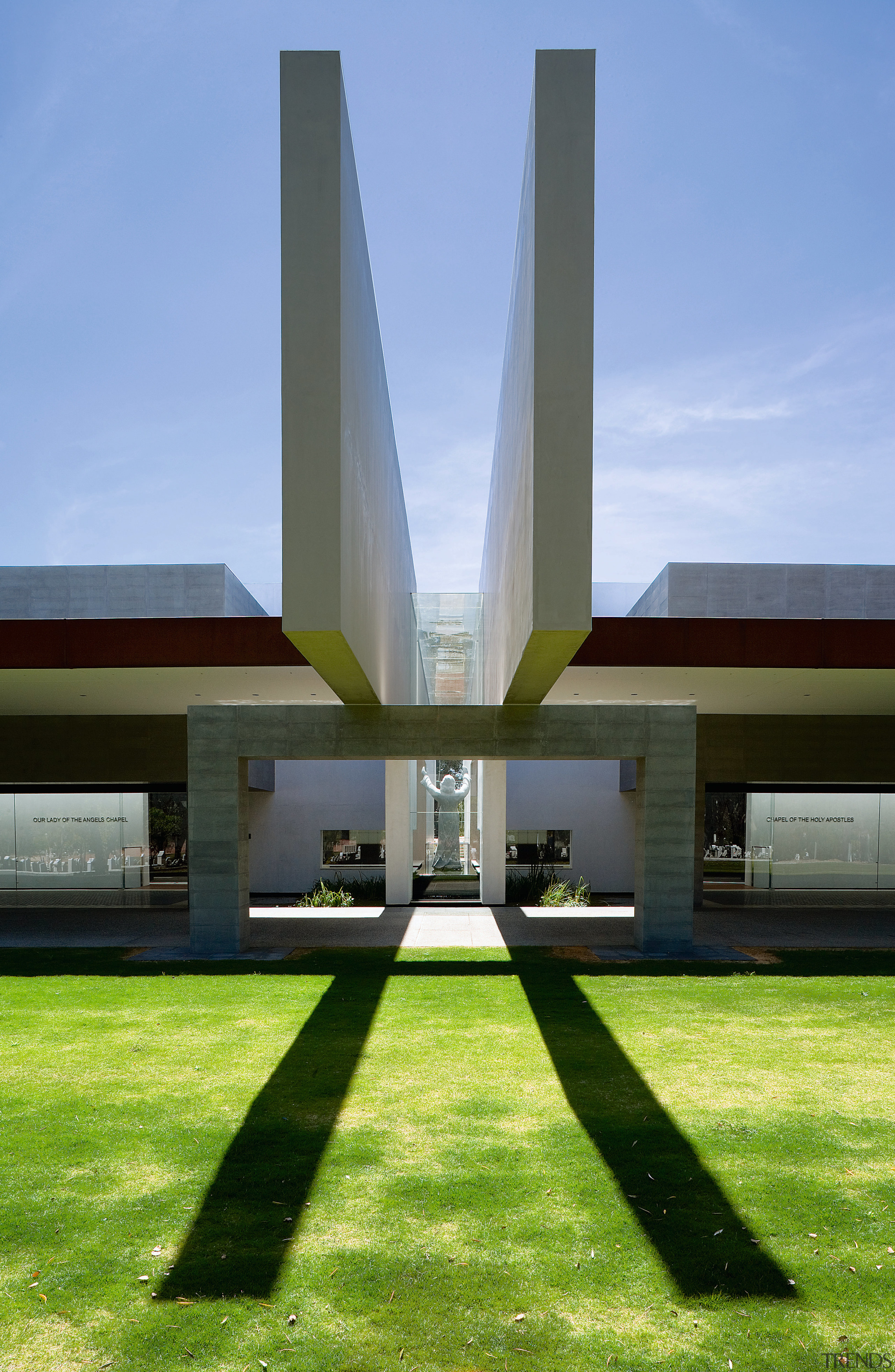 Exterior view of the freemantle Mausoleum featuring glass architecture, daytime, grass, house, landmark, sky, teal