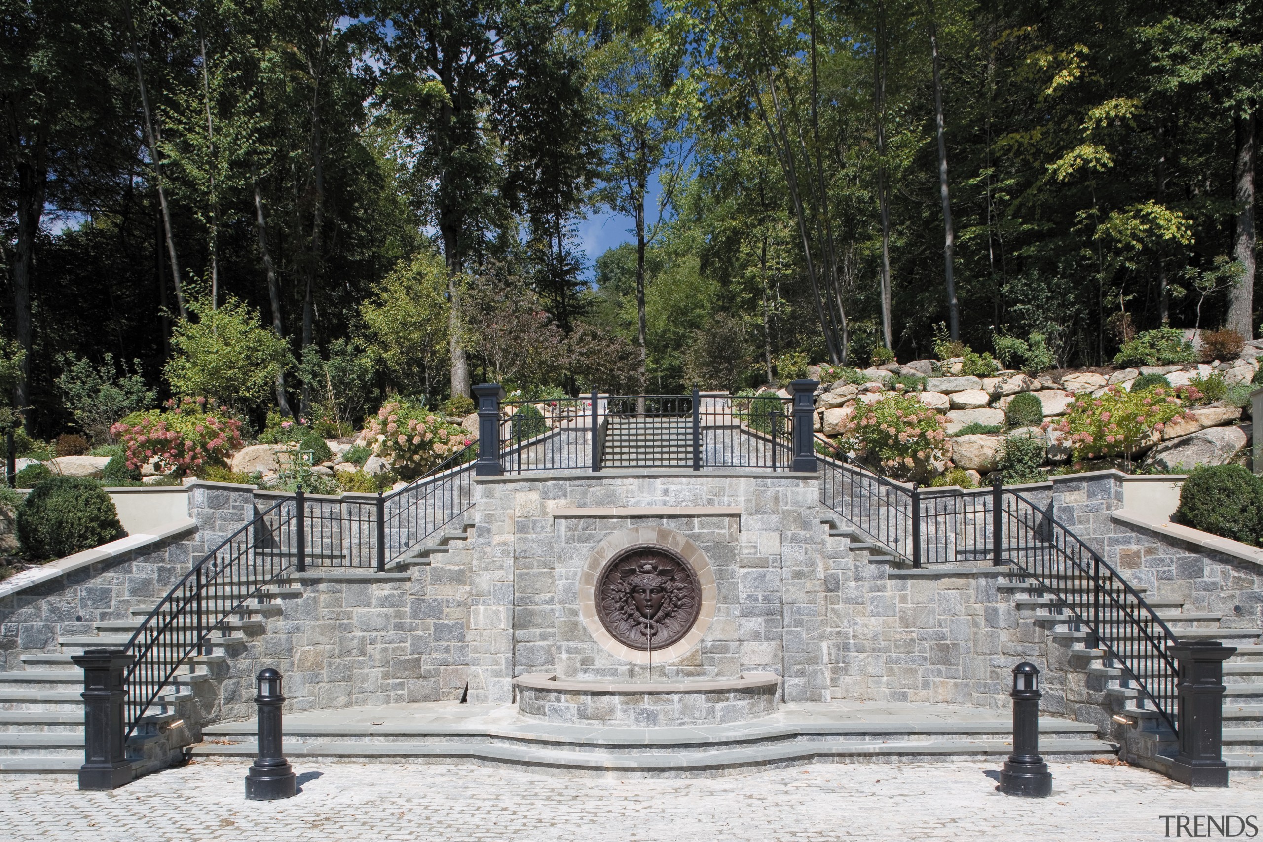 Exterior view of the landscaped gardens and pavings, outdoor structure, walkway, wall, gray, black