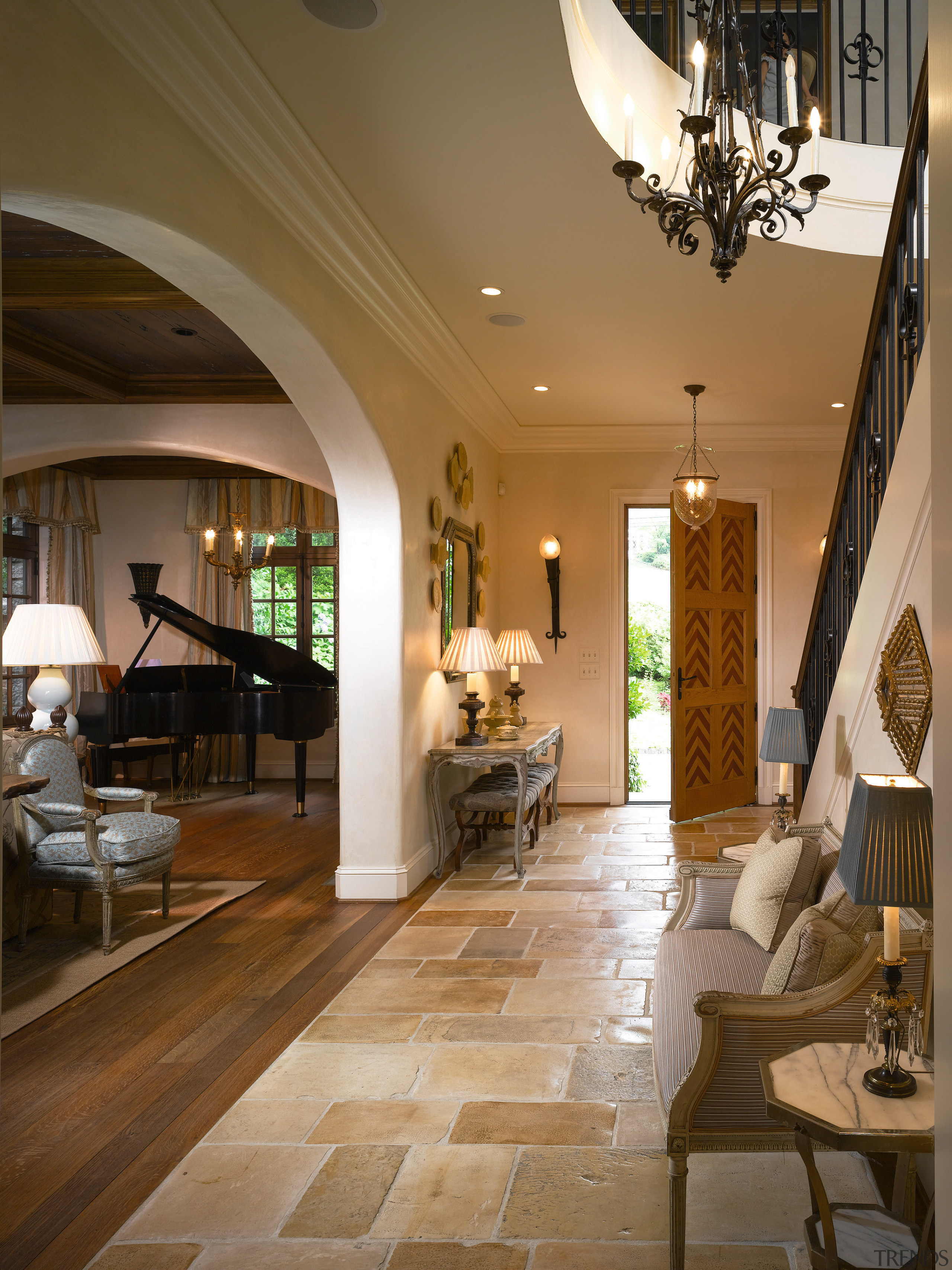 A view of this entrance hallway featuring tiled ceiling, estate, floor, flooring, hardwood, home, interior design, laminate flooring, living room, lobby, room, wood, wood flooring, brown