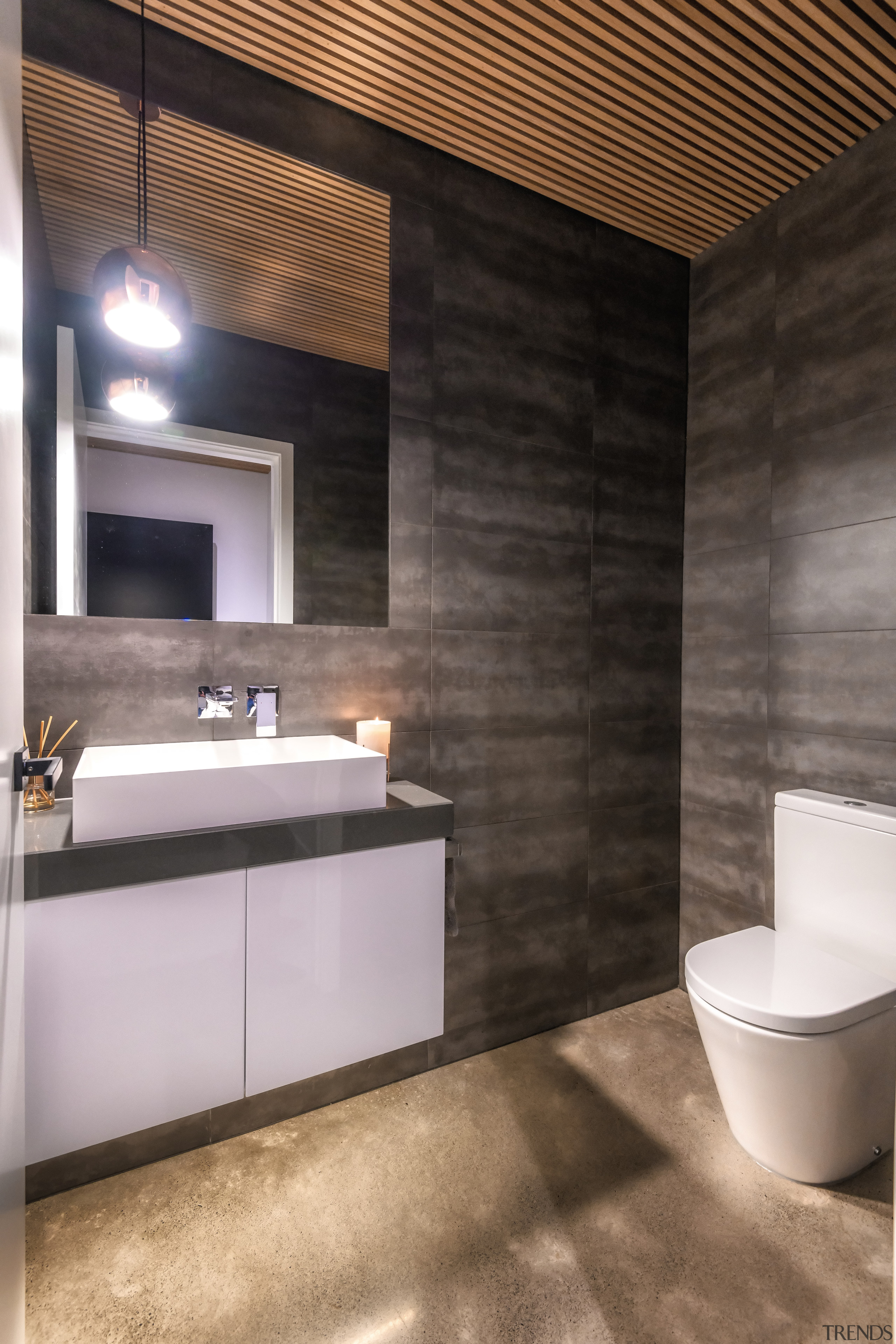 A concealed extraction system in the powder room architecture, bathroom, beige, bidet, brown, building, ceiling, ceramic, floor, flooring, furniture, home, house, interior design, lighting, material property, plumbing fixture, property, room, sink, tap, tile, wall, black