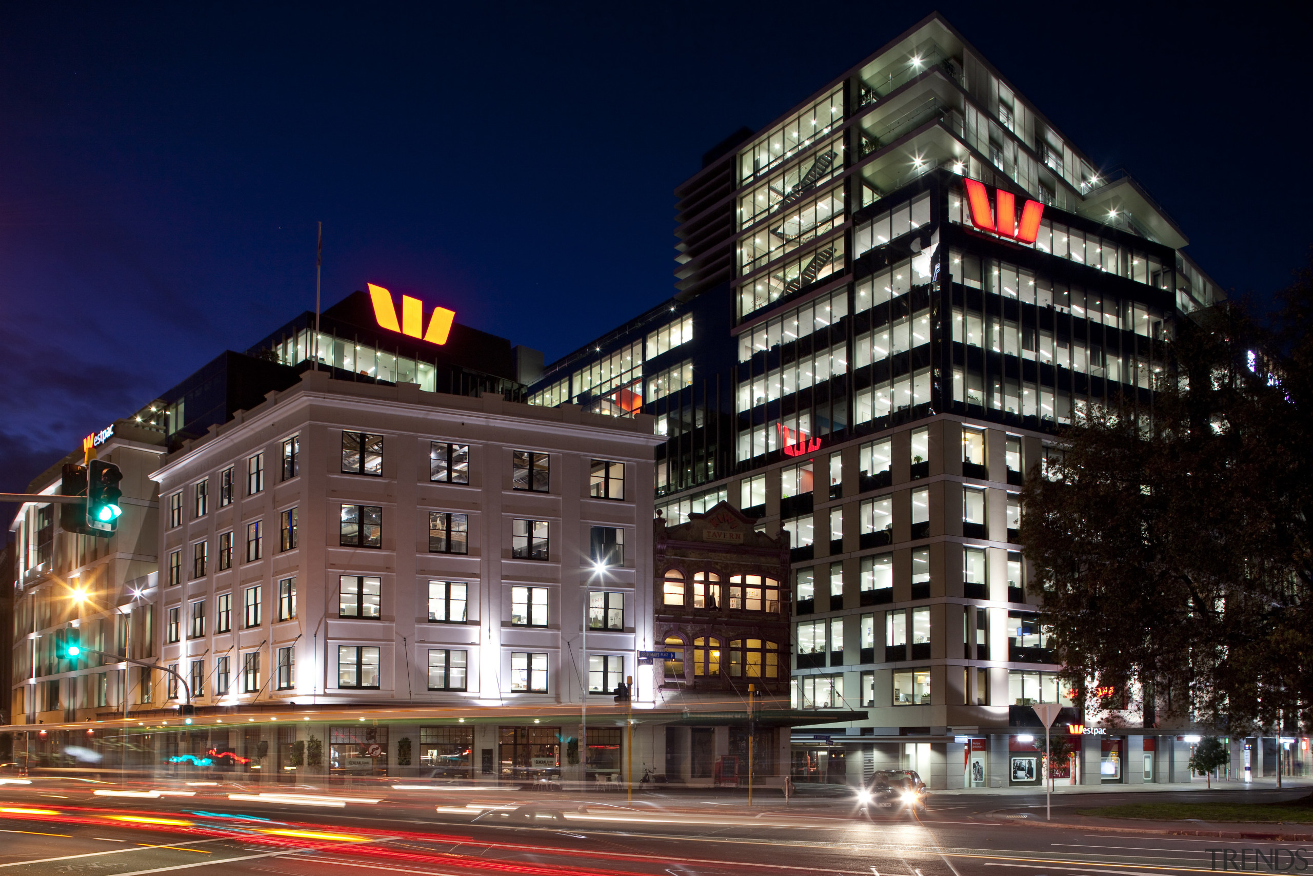 View of the Westpac head office at the architecture, building, city, cityscape, commercial building, condominium, corporate headquarters, downtown, evening, facade, hotel, infrastructure, landmark, lighting, metropolis, metropolitan area, mixed use, neighbourhood, night, reflection, residential area, sky, skyscraper, tower block, town, urban area, blue, black