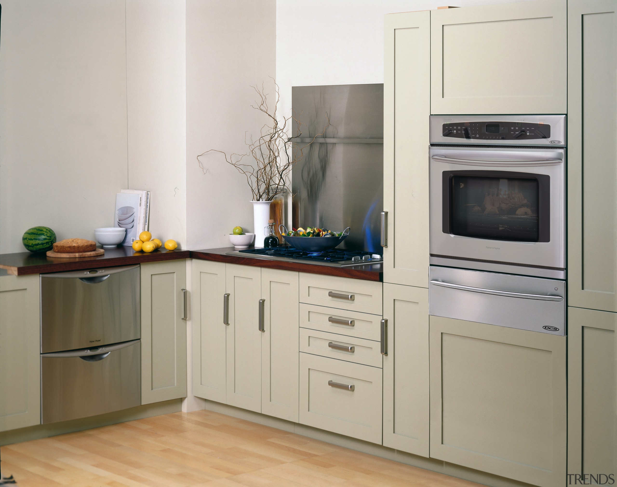 View of a kitchen, cream cabinetry, wooden benchtop, cabinetry, countertop, cuisine classique, home appliance, kitchen, kitchen appliance, kitchen stove, major appliance, product, refrigerator, room, gray