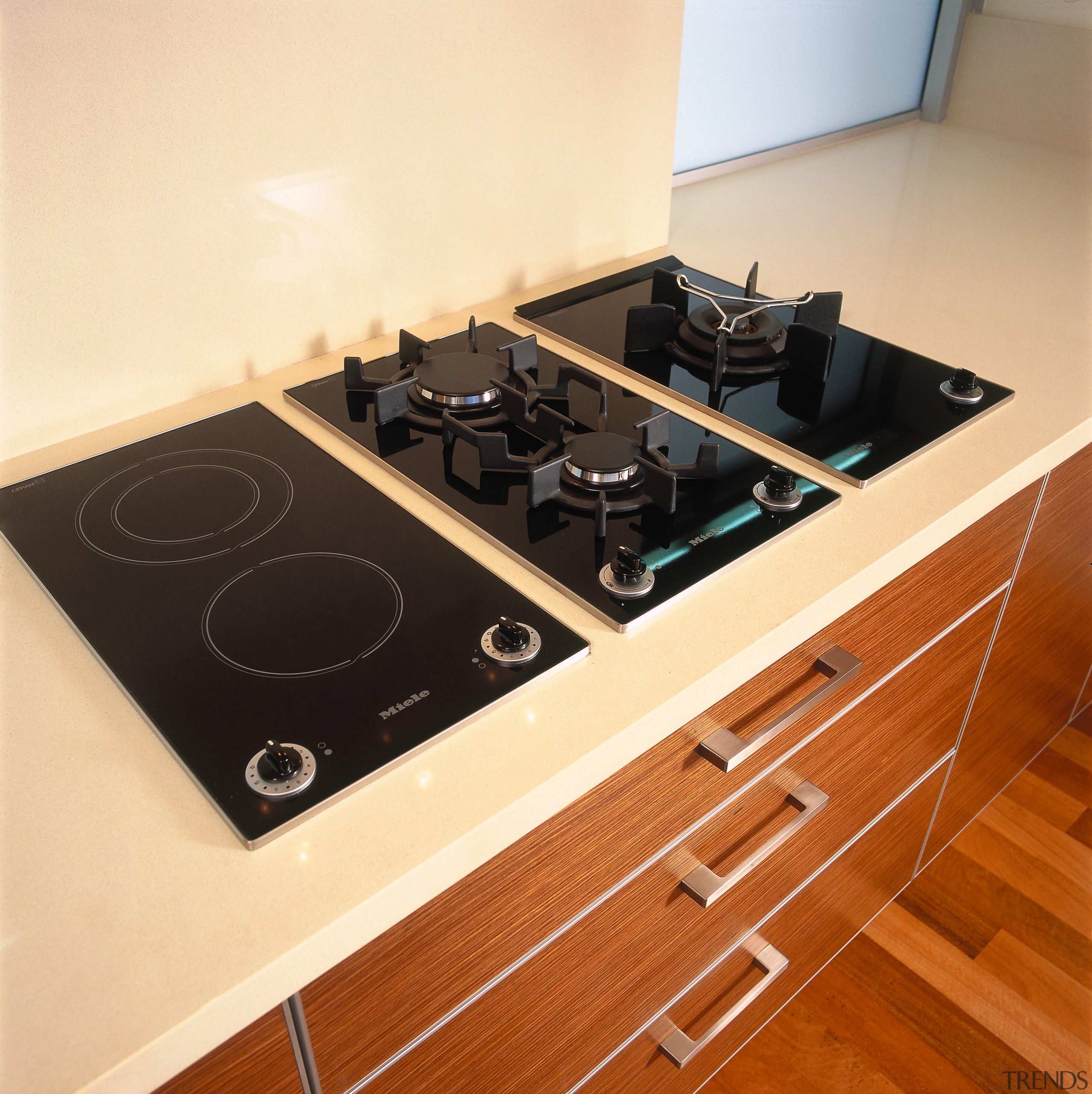 view of the miels ceramic hob - view countertop, floor, flooring, kitchen, kitchen stove, sink, orange