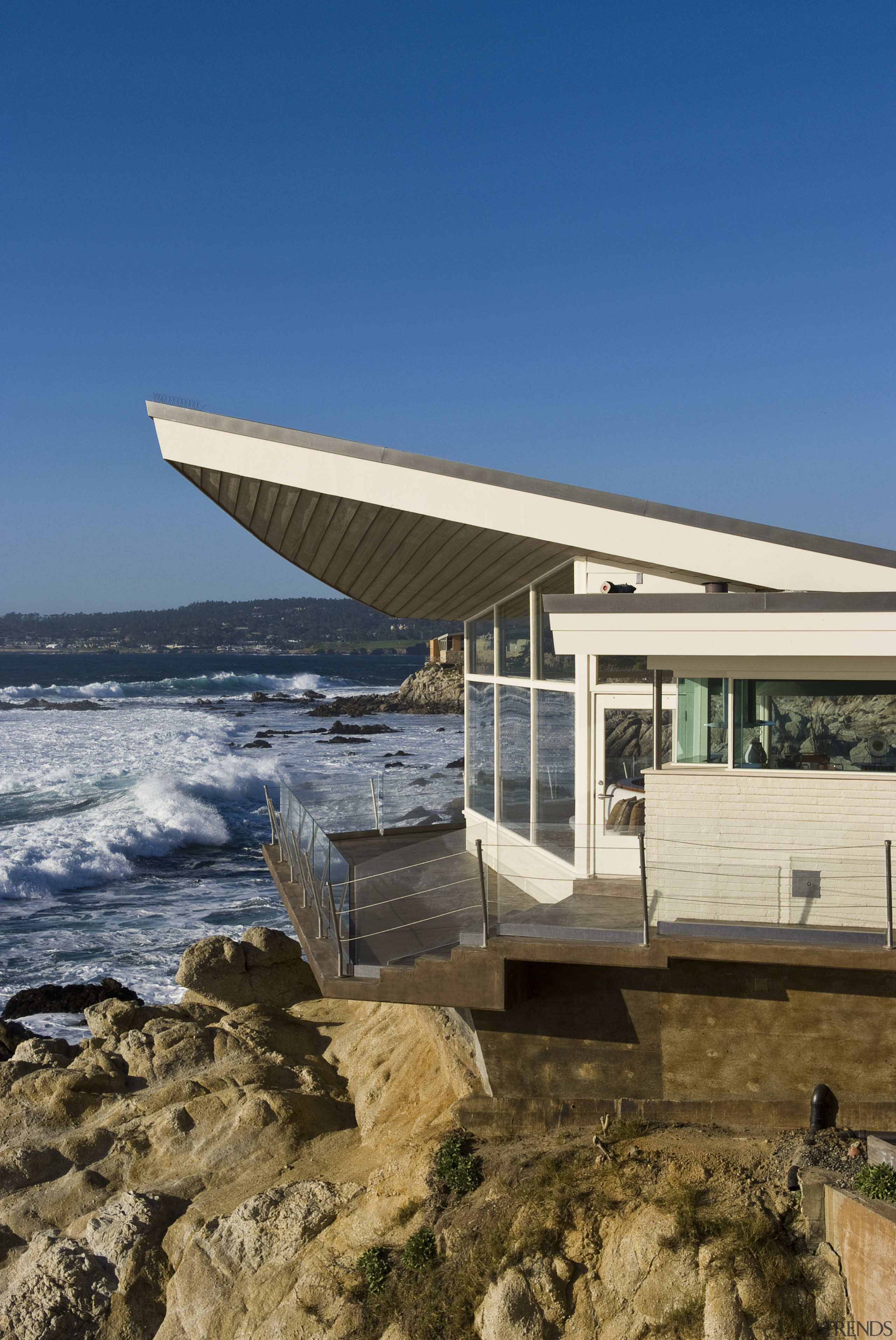 View of the oceanfront Butterfly House in Carmel architecture, home, house, sea, sky, blue, brown