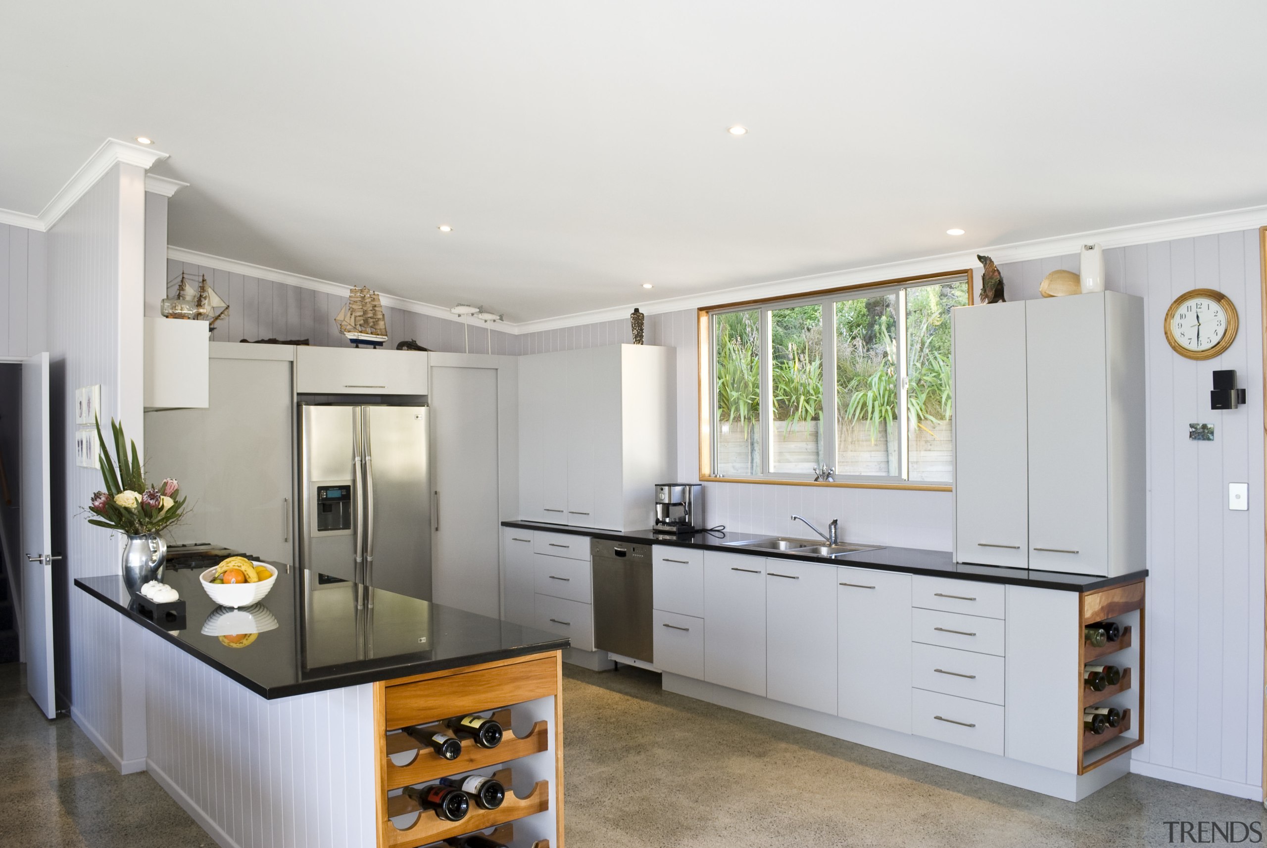 View of the kitchen with island, white cabinetry, countertop, cuisine classique, interior design, kitchen, real estate, room, white, gray