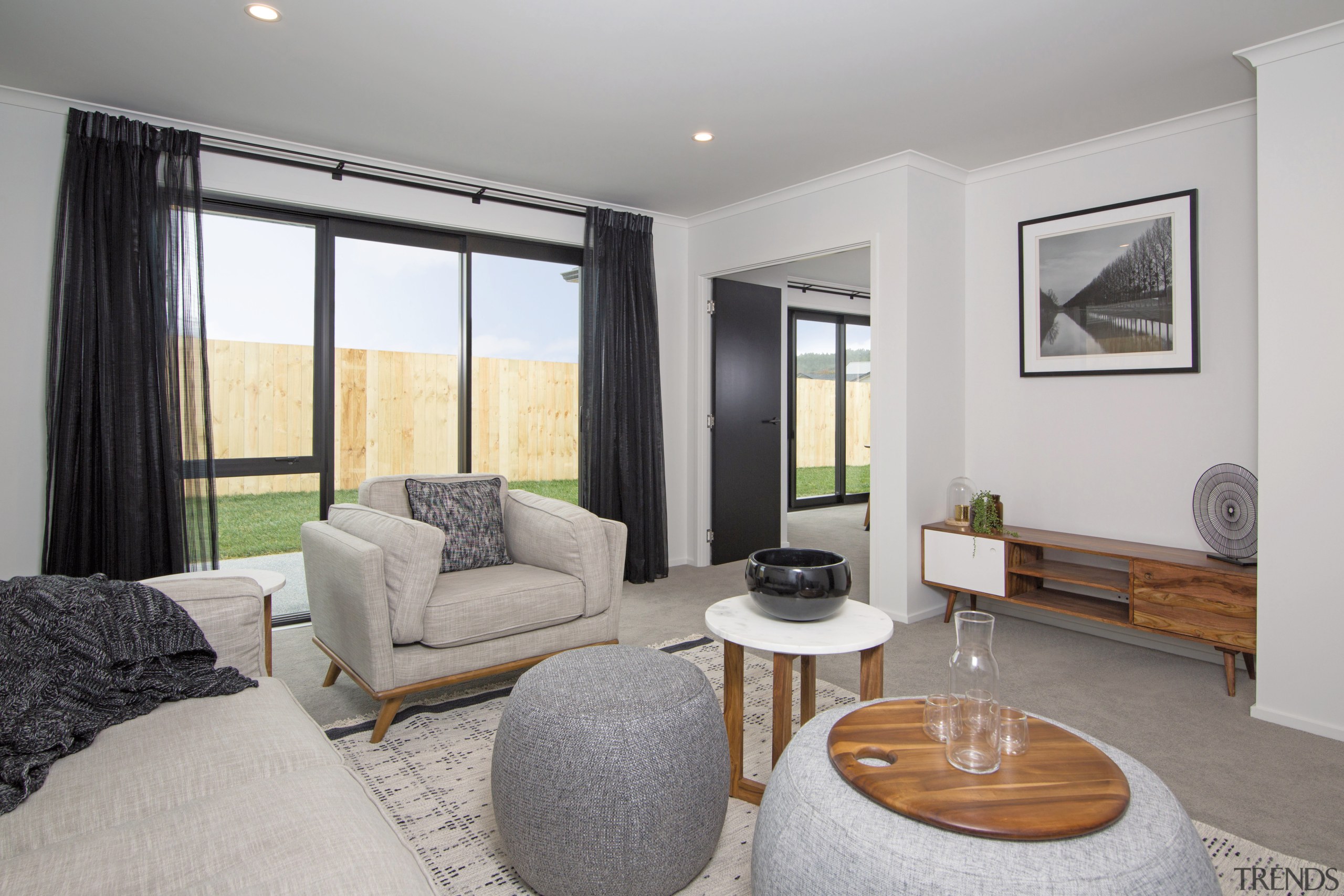 Expansive windows ensure light-filled interiors for this showhome home, interior design, living room, property, real estate, room, window, gray