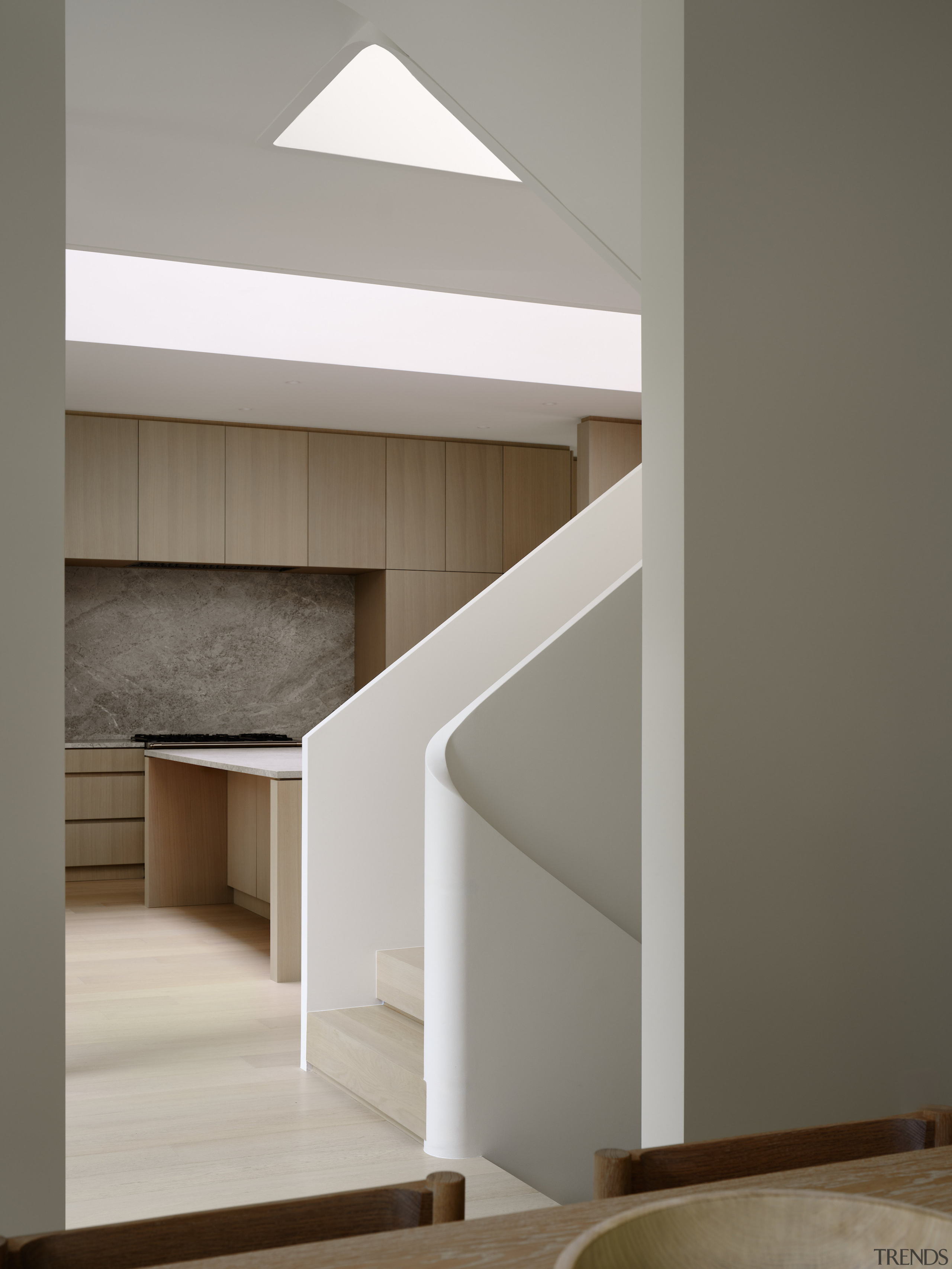 The curved turn in the staircase adds to 