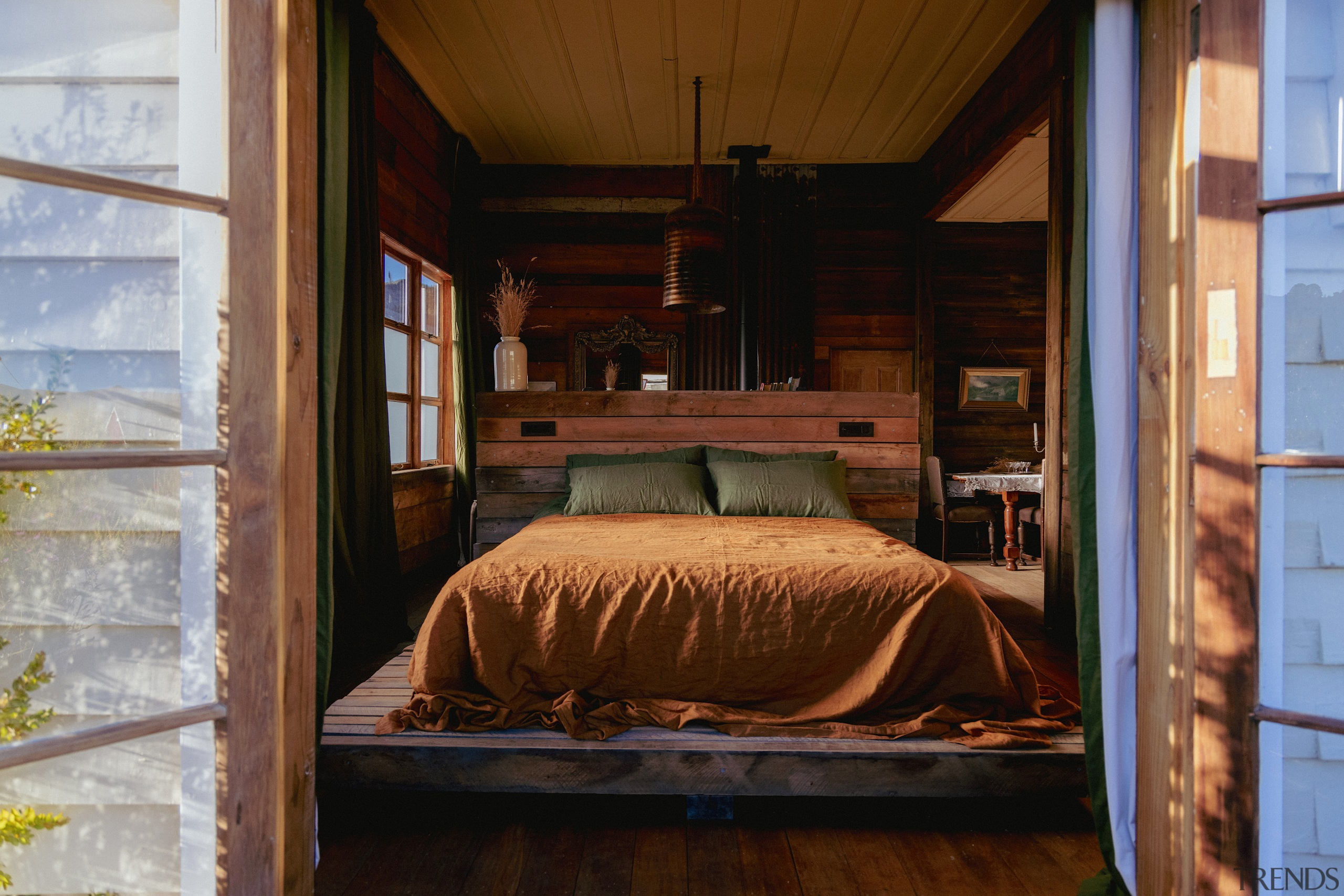 Custom feature bed and bedhead created from recycled 
